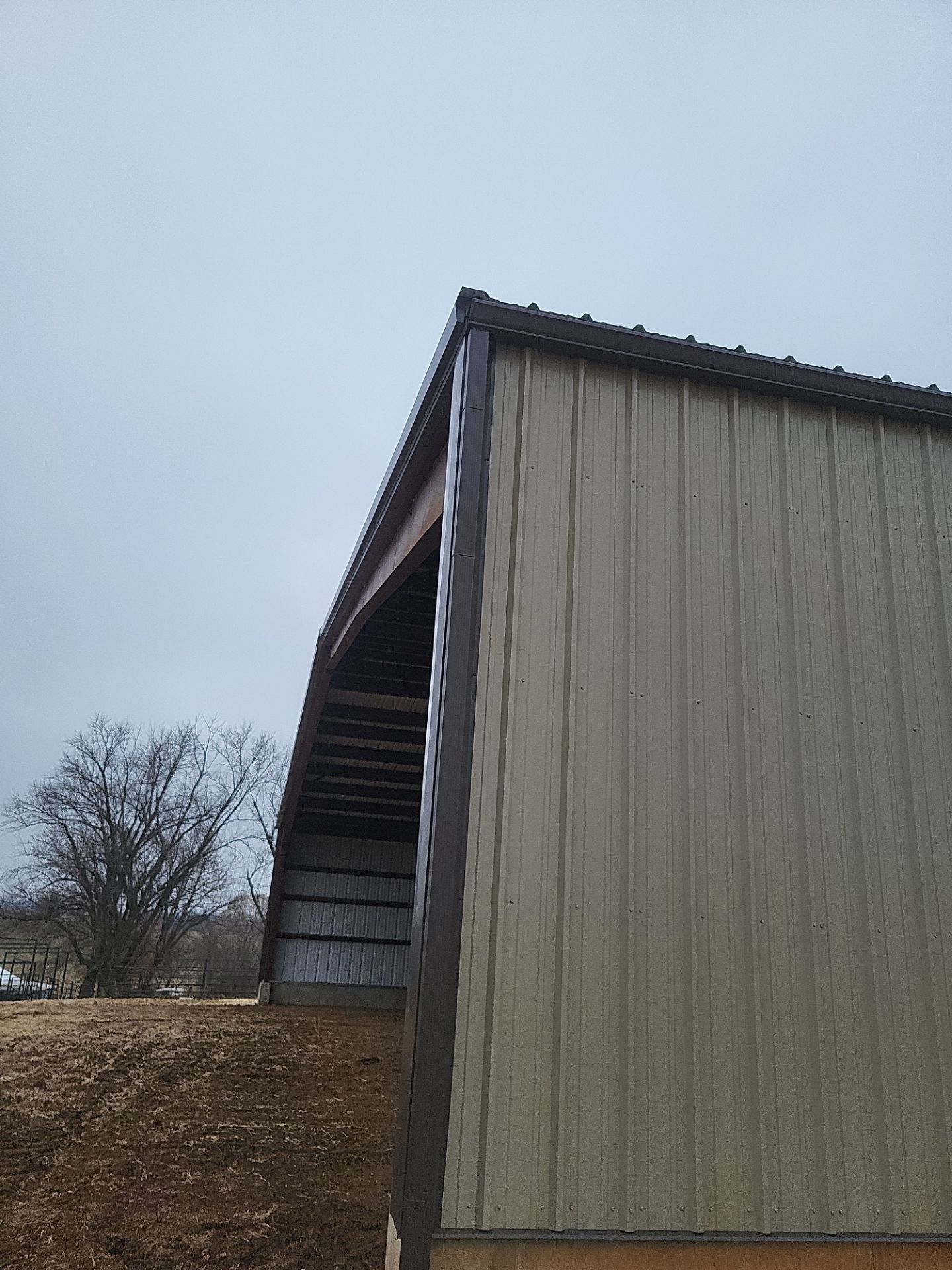 Metal Shop 6" Gutters & Downspouts Install - Color Musket Brown  by Titan Commercial & Residential Roofing 
