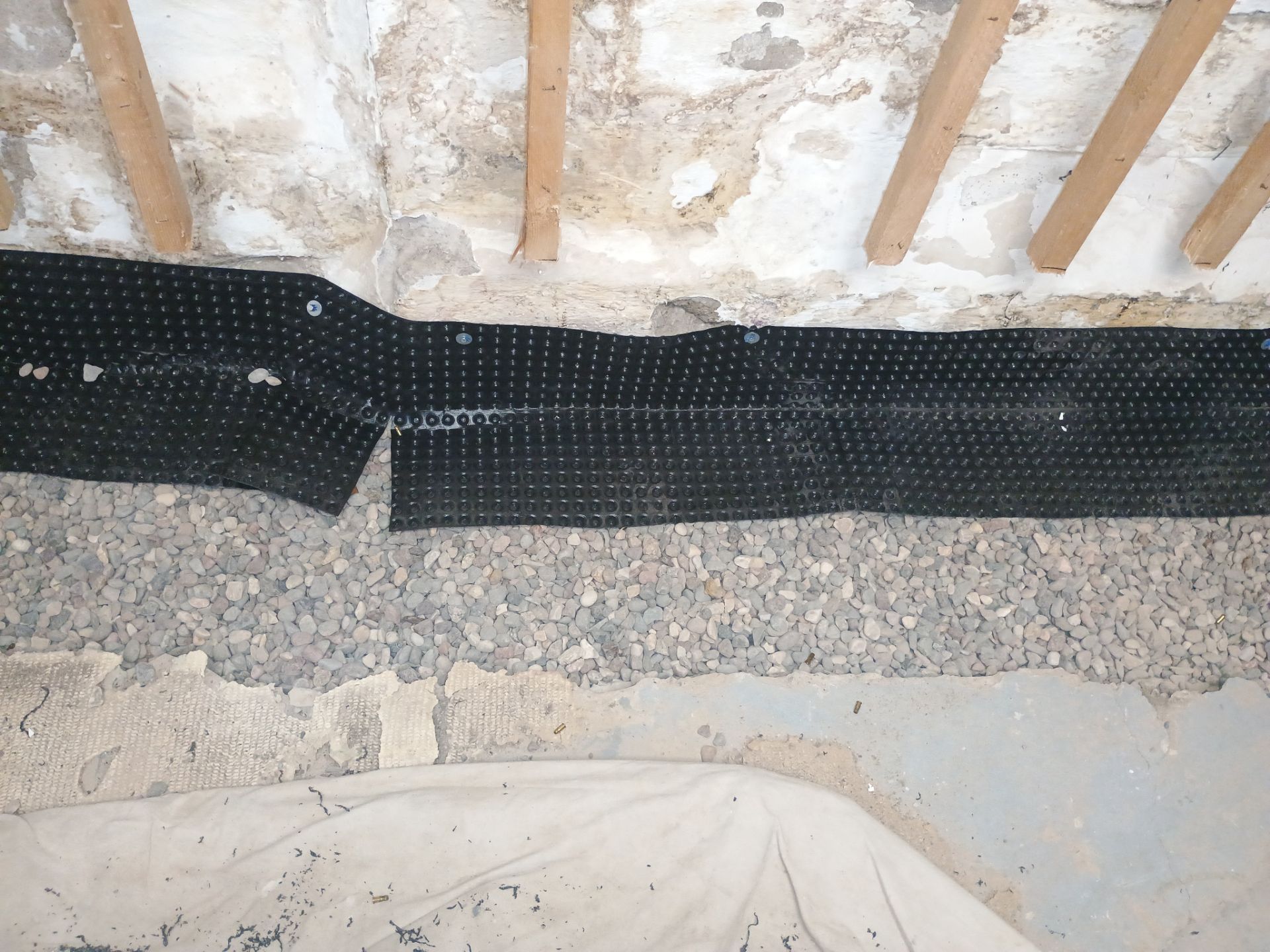 Interior Drain Tile Installation in South Minneapolis by Waterproofing Northeast