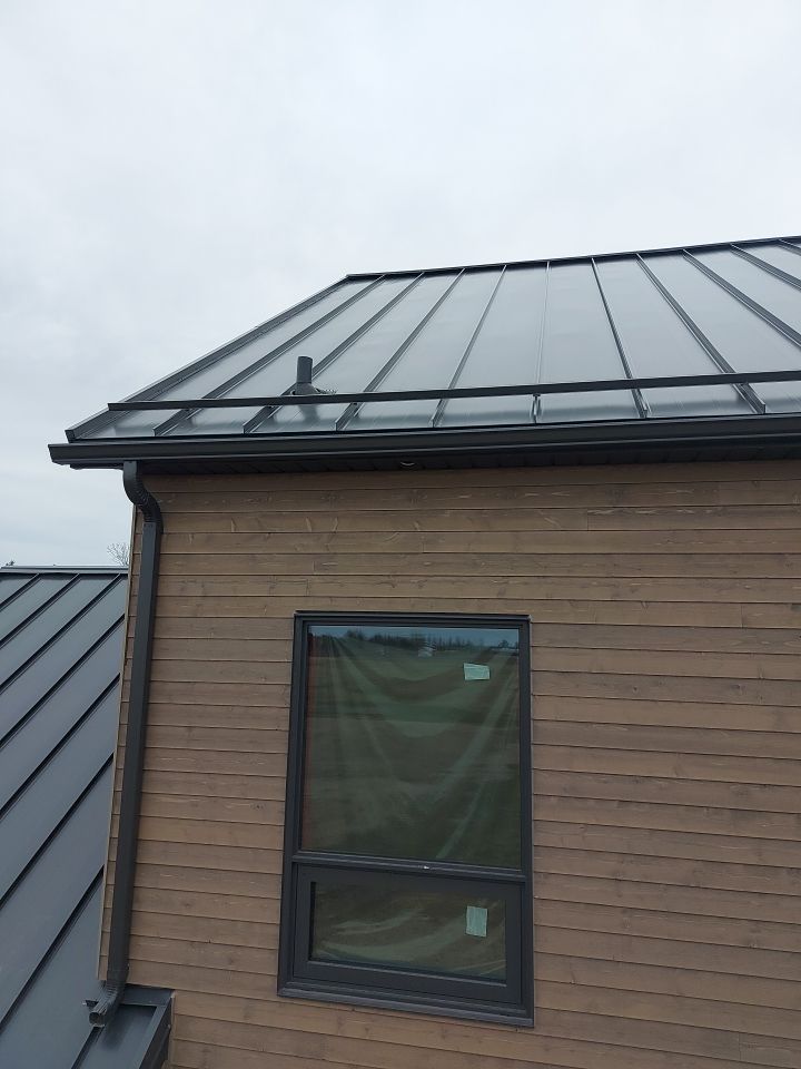 New Home Construction using 16" Standing Seam Panels by Jay Carter Roofing & Sheet Metal