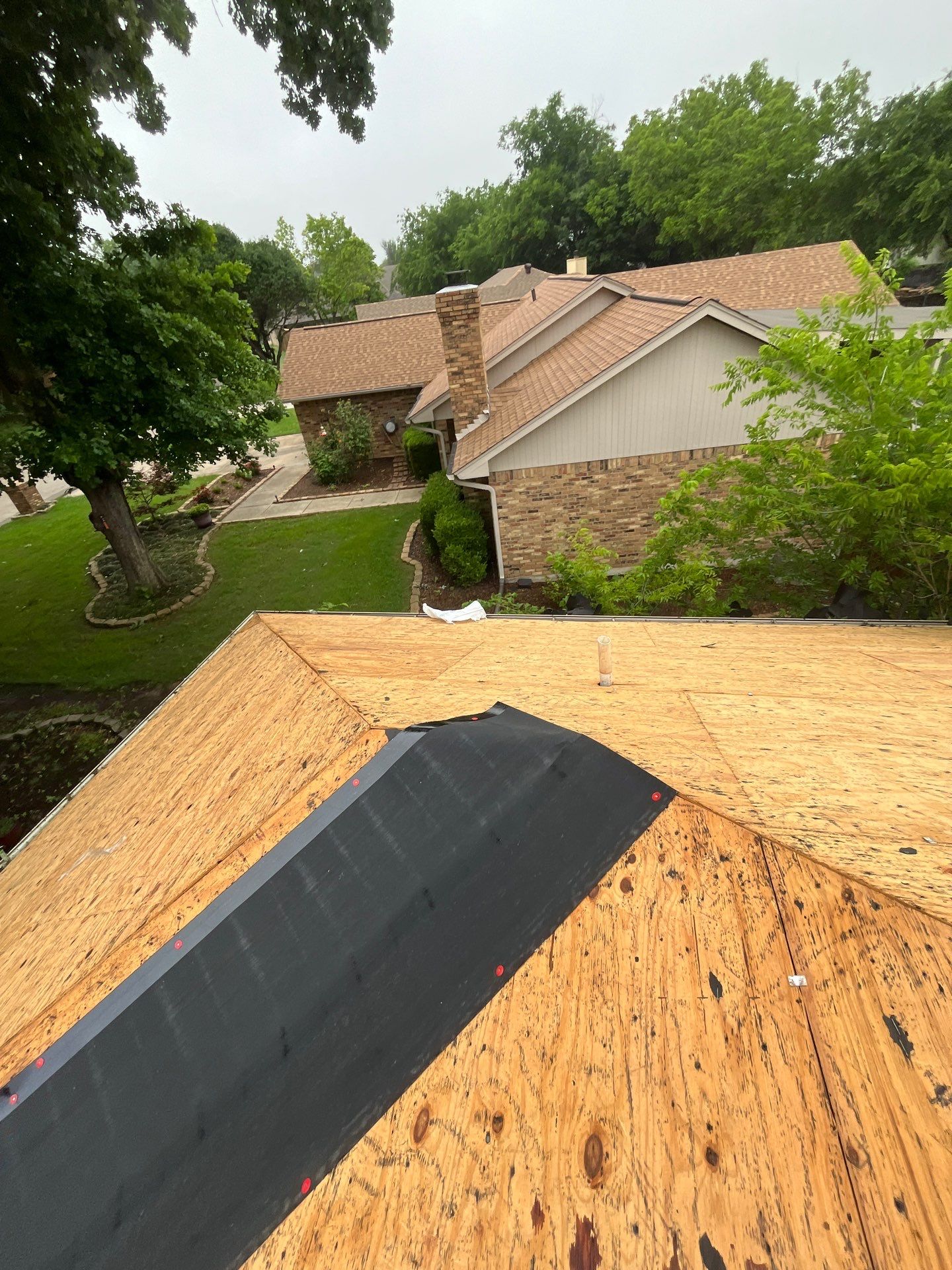 New Sky light/ New Roof/ Gutters and Fence Staining.  by Berry Good Roofing 