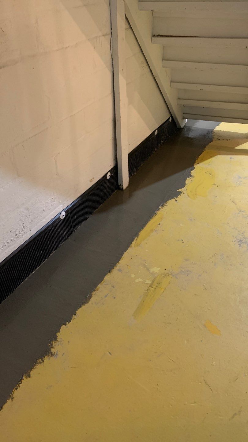 From a Conversation to a Dry Basement for Scott & Jean by Waterproofing Northeast