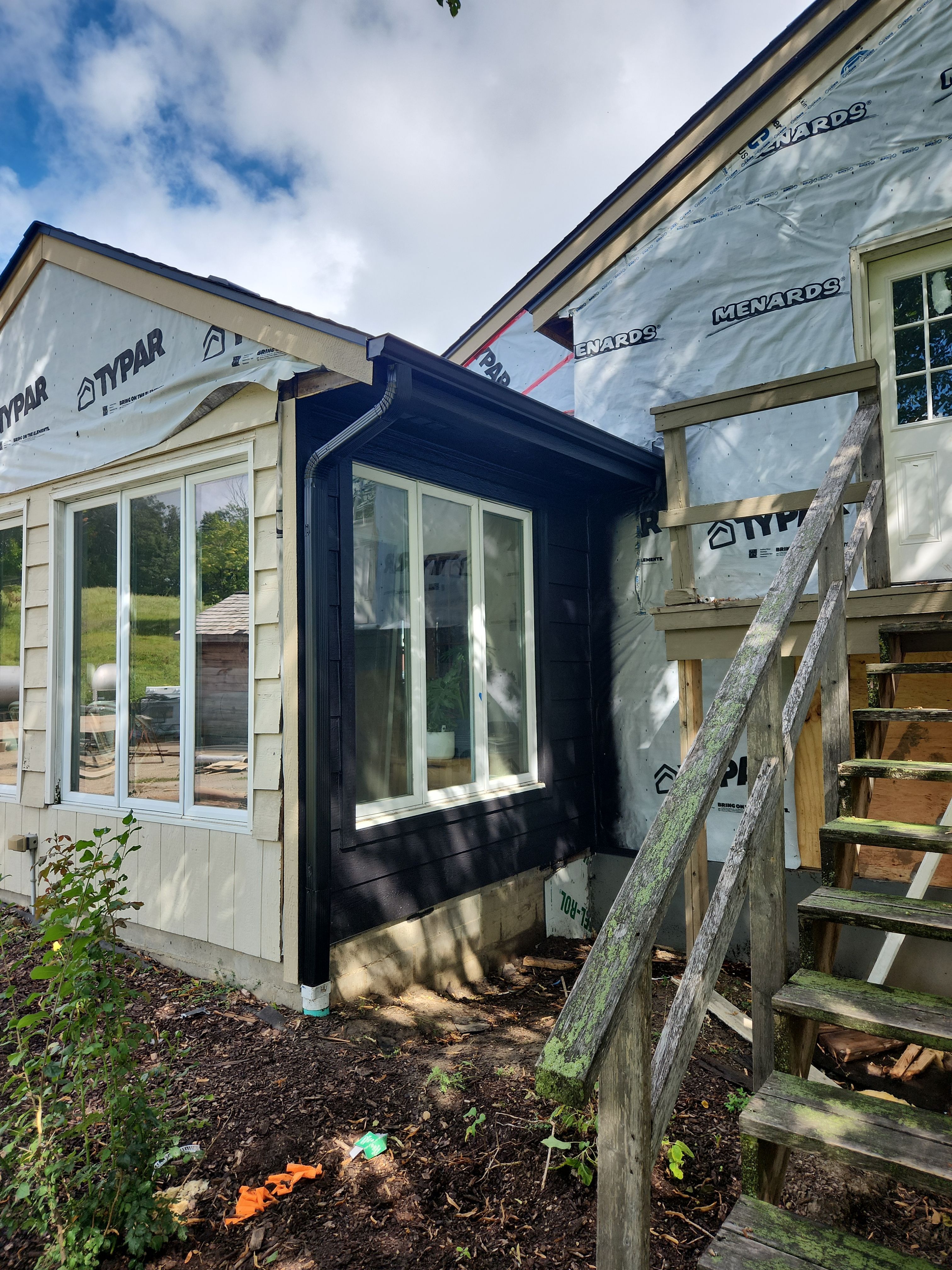 Black Seamless Gutters in Buffalo, MN by Next Level Seamless Gutters / Exteriors Inc.