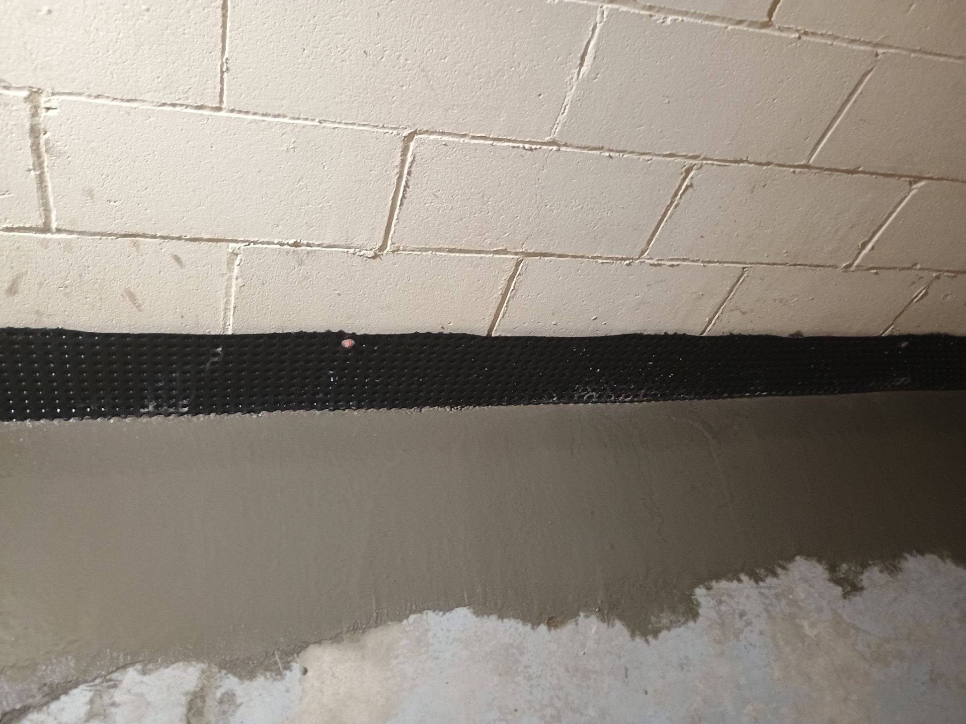 Drain Tile & Sump Pump for Kassie's Rental Property by Waterproofing Northeast