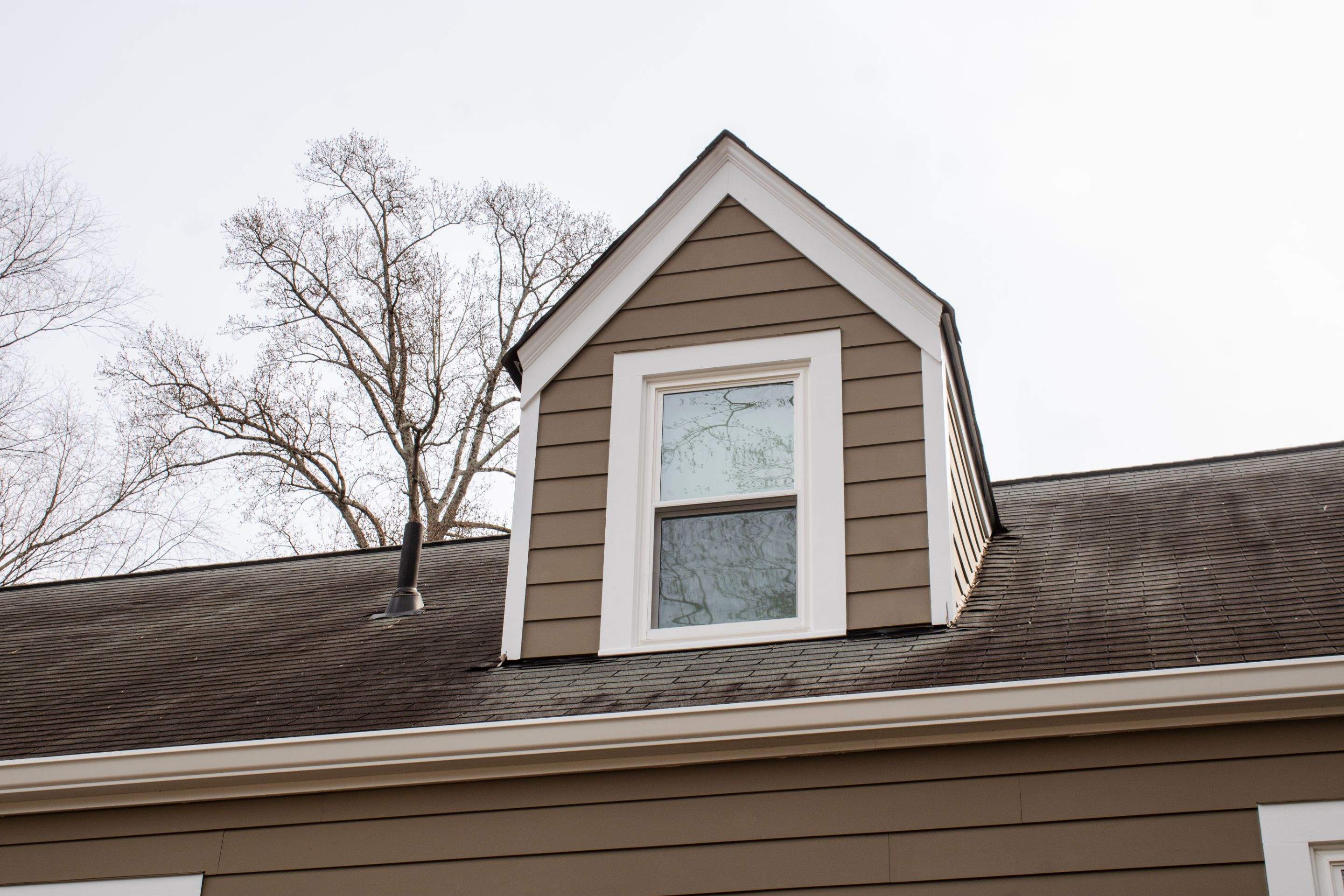 Full Siding Replacement, Deck Build, Exterior Paint, and Gutter Replacement by Nelson Exteriors