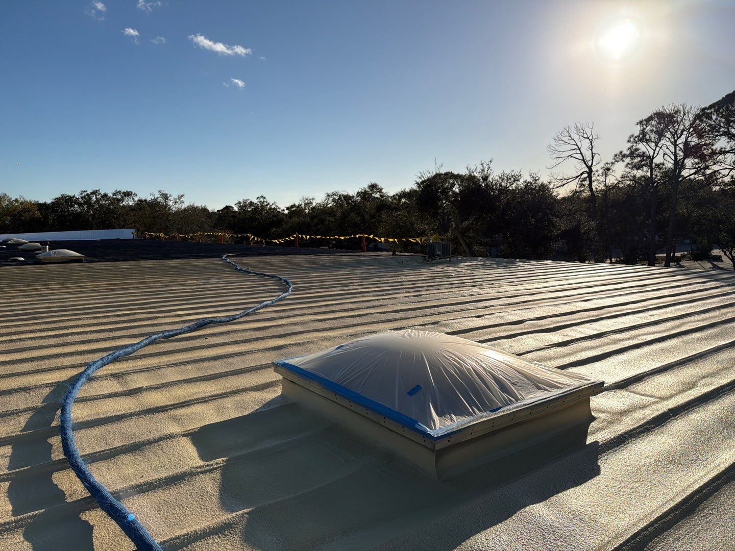 Sarasota Industrial Warehouse Metal Roof Silicone Coating Restoration by CES Roofing