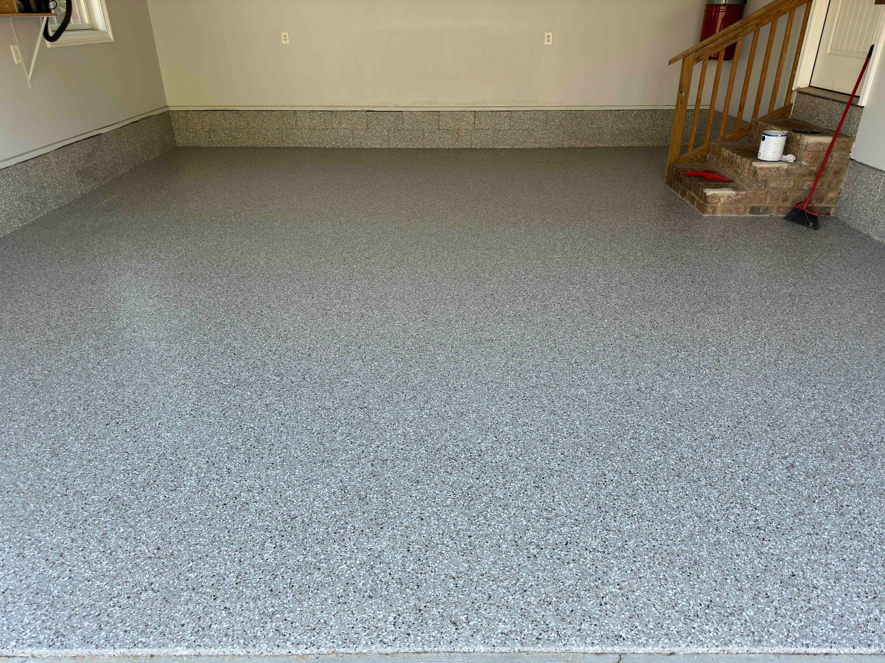 Front Porch and Garage using Creekbed by Elite Floor Solutions