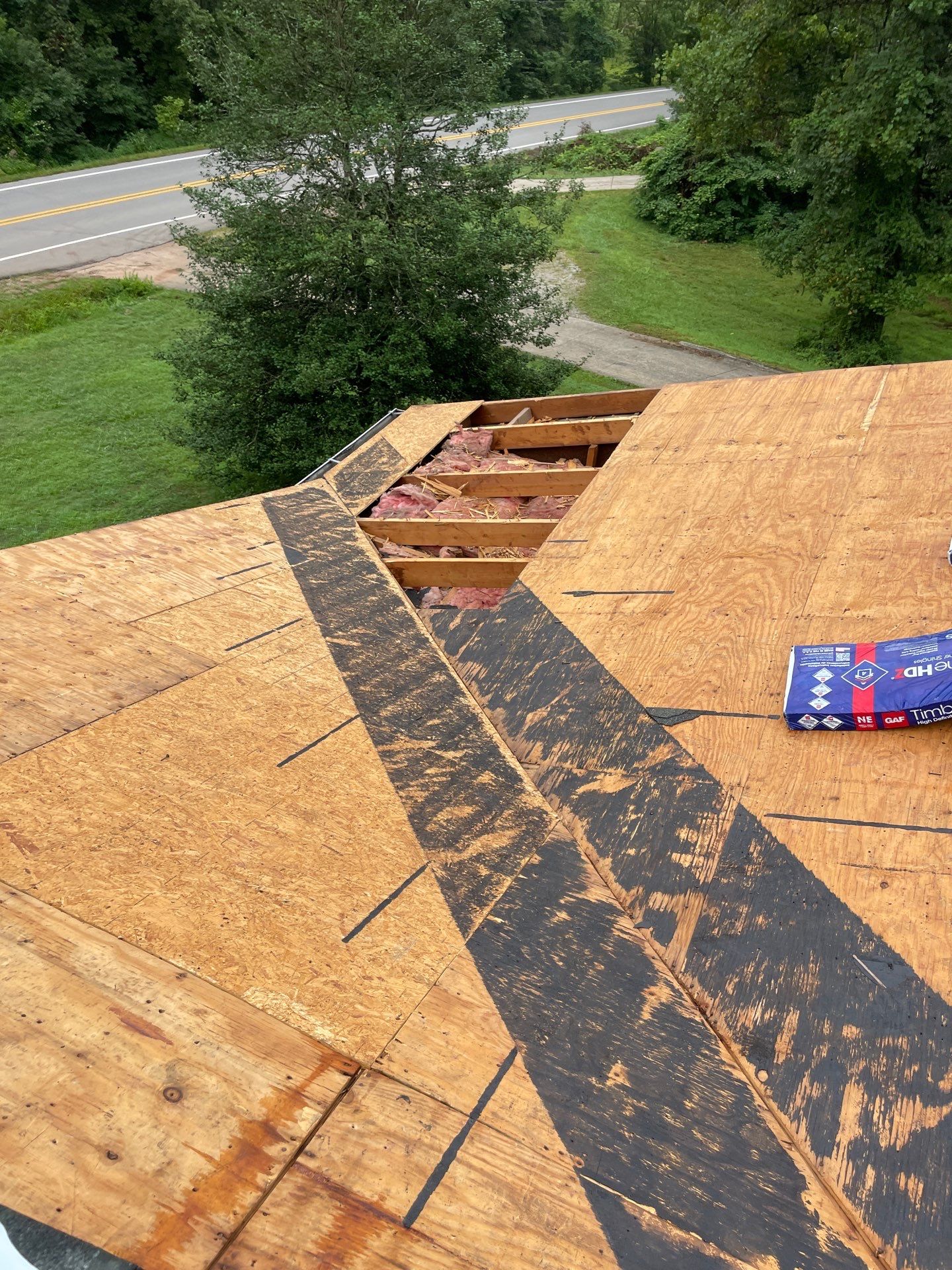 Residential Roofing Installation using GAF Timberline HDZ Charcoal by Rainstoppers Roofing