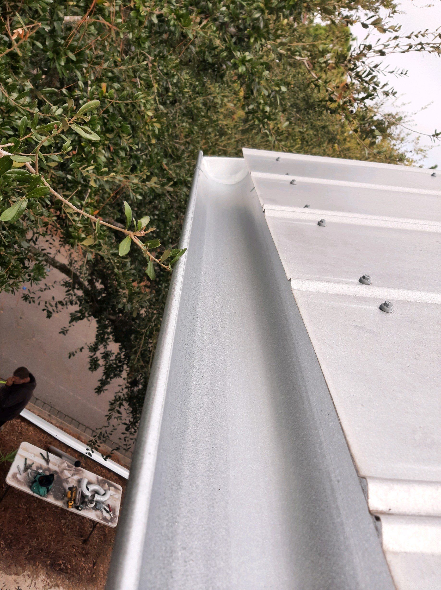 Gutter Installation using Galvalume Half Round Seamless Gutters by Gutter Professors