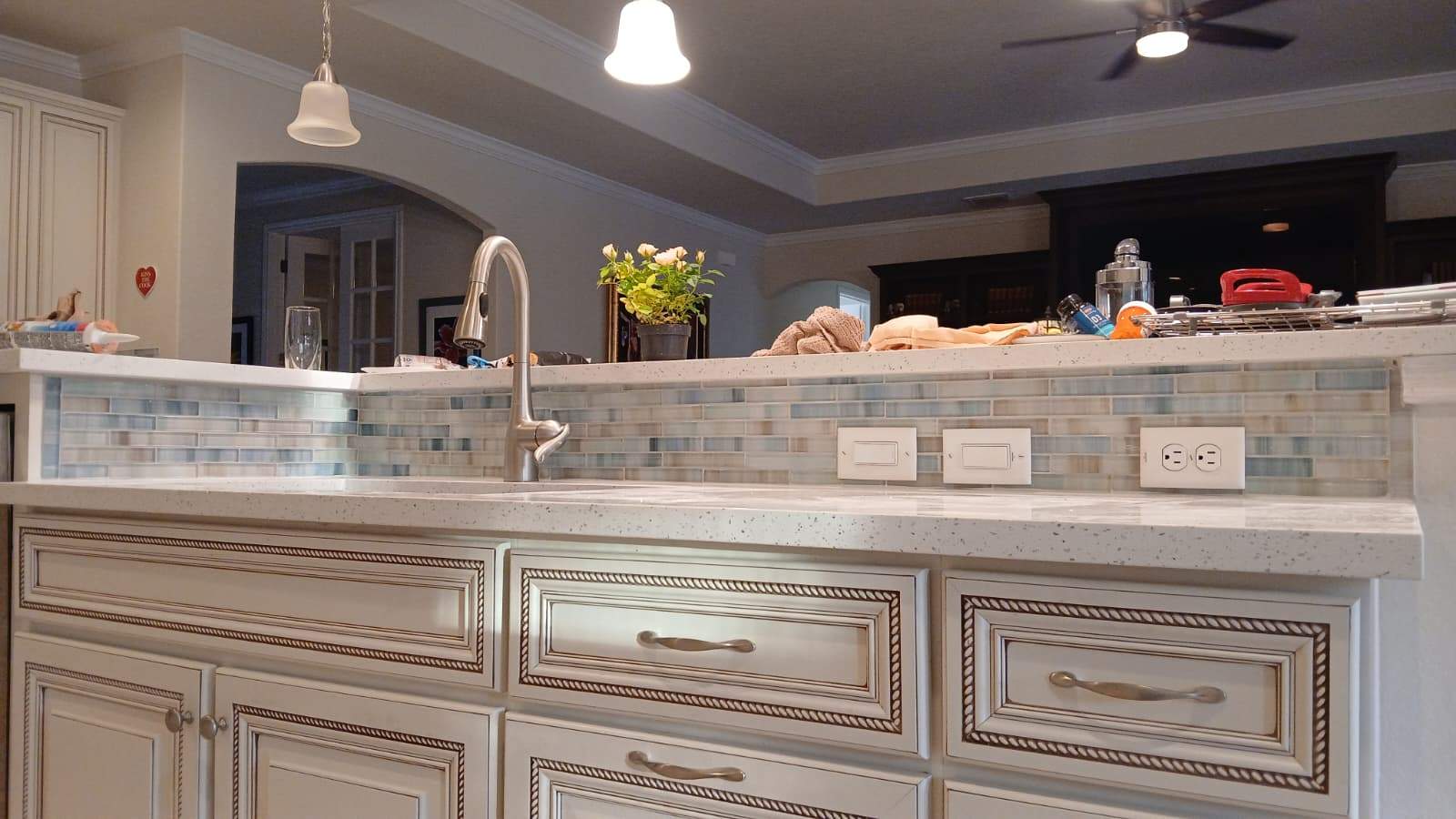 San Antonio Kitchen Remodel with Quartz Counters and Glass Backsplash by Mena stone surfaces