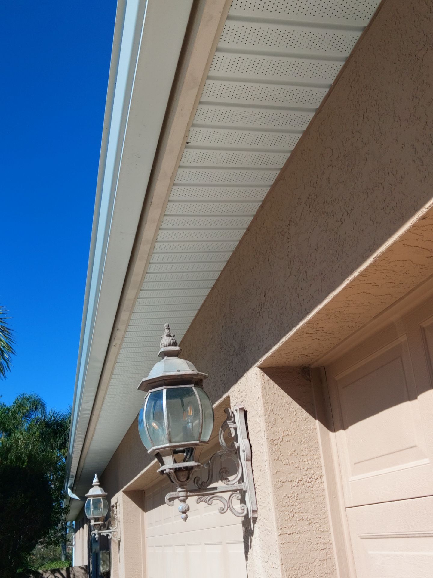 White Soffit and Fascia Installation for Coastal Homes in Sarasota FL by Gutter Professors