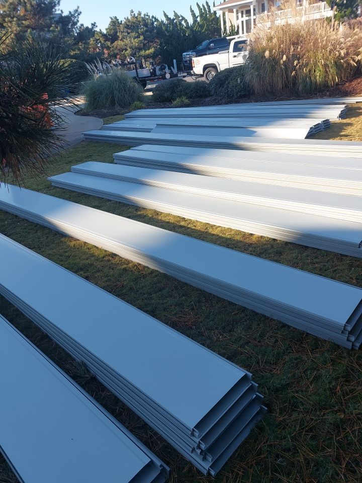 Large Metal Roof Transformation by Gallop Roofing & Remodeling, Inc.