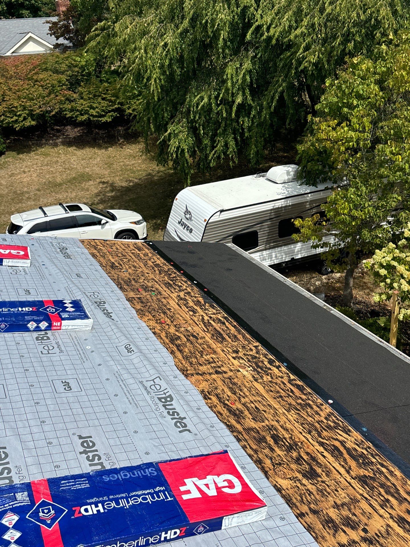Residential Roofing Installation using Timberline HDZ Shingles - Weathered Wood by RoofX 