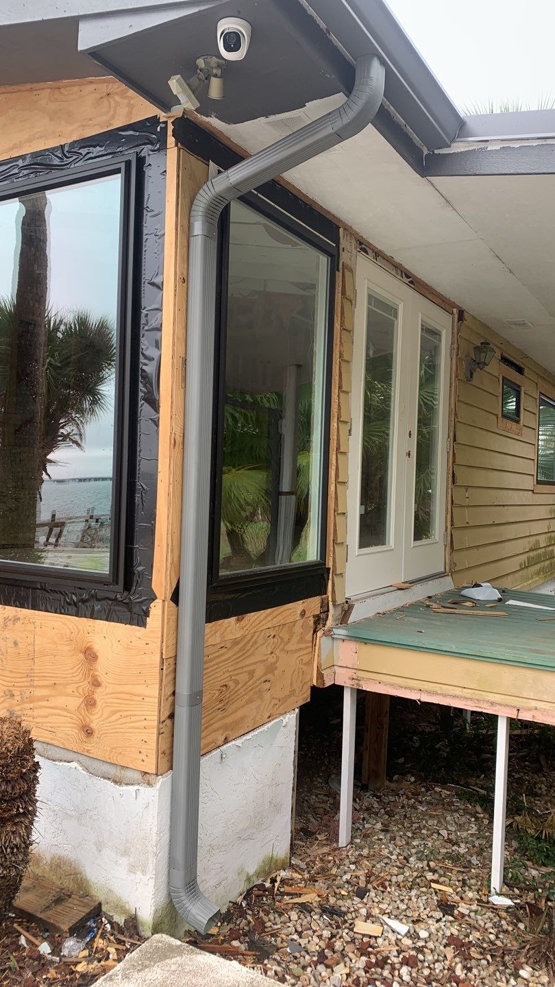 Seamless Gutter Installation using Charcoal Grey Gutters by Gutter Professors