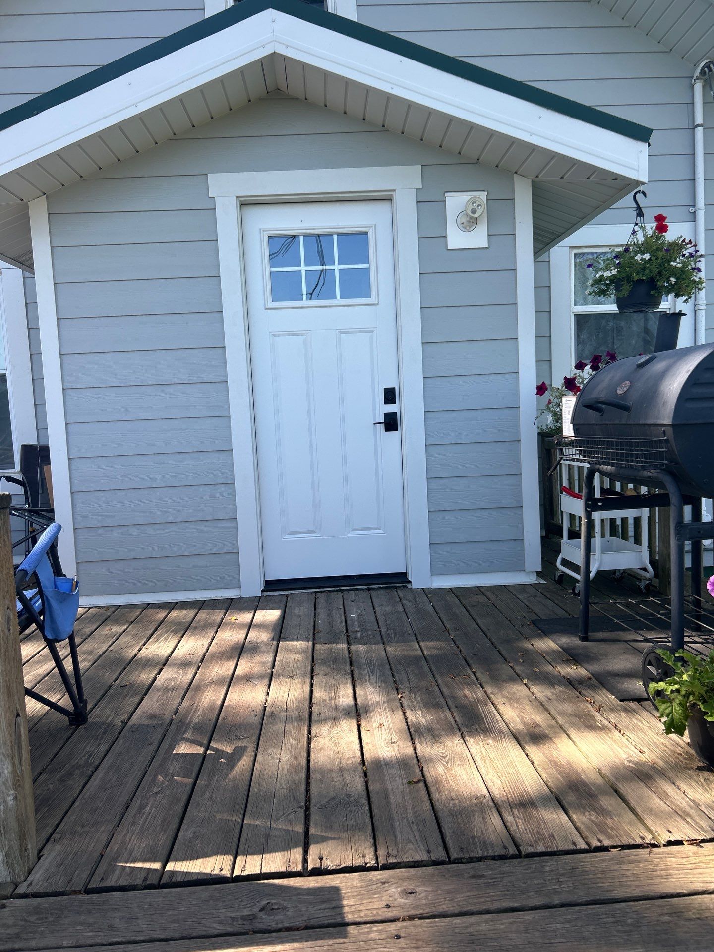 Light Mist Siding and Exterior Door Installation in Sidney by Carps Complete Exteriors