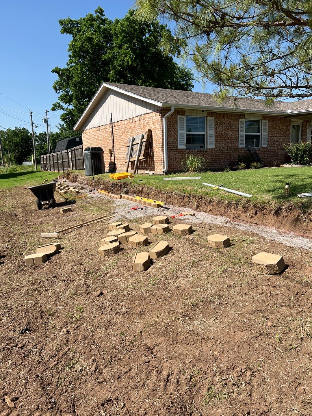Retaining Wall using Rocks by Clays Services Inc