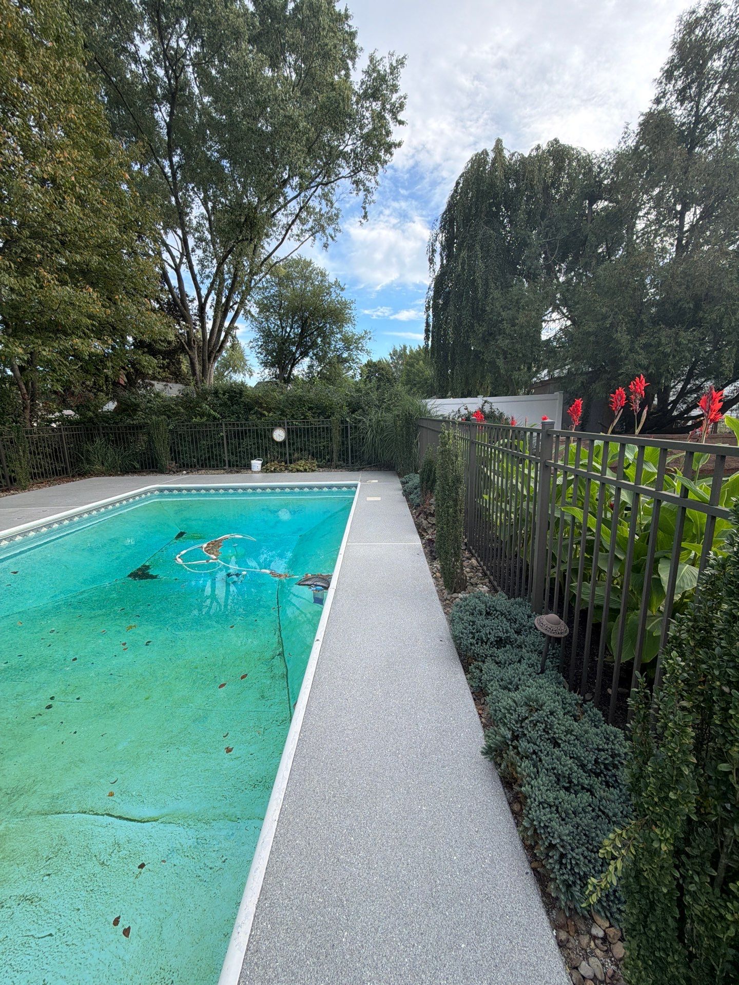 Blue Granite Pool Patio Concrete Coating in Lincoln Park by Spectrum Painting, LLC
