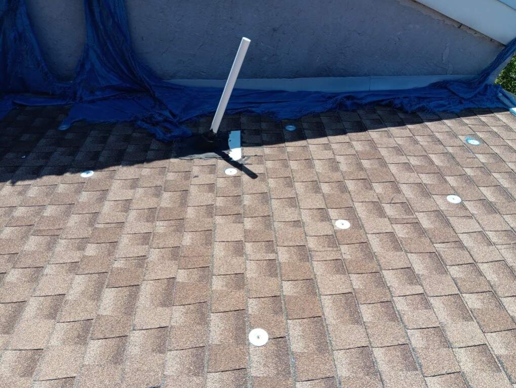 Residential Roofing Installation using Landmark Shingles by Alpha Design Services