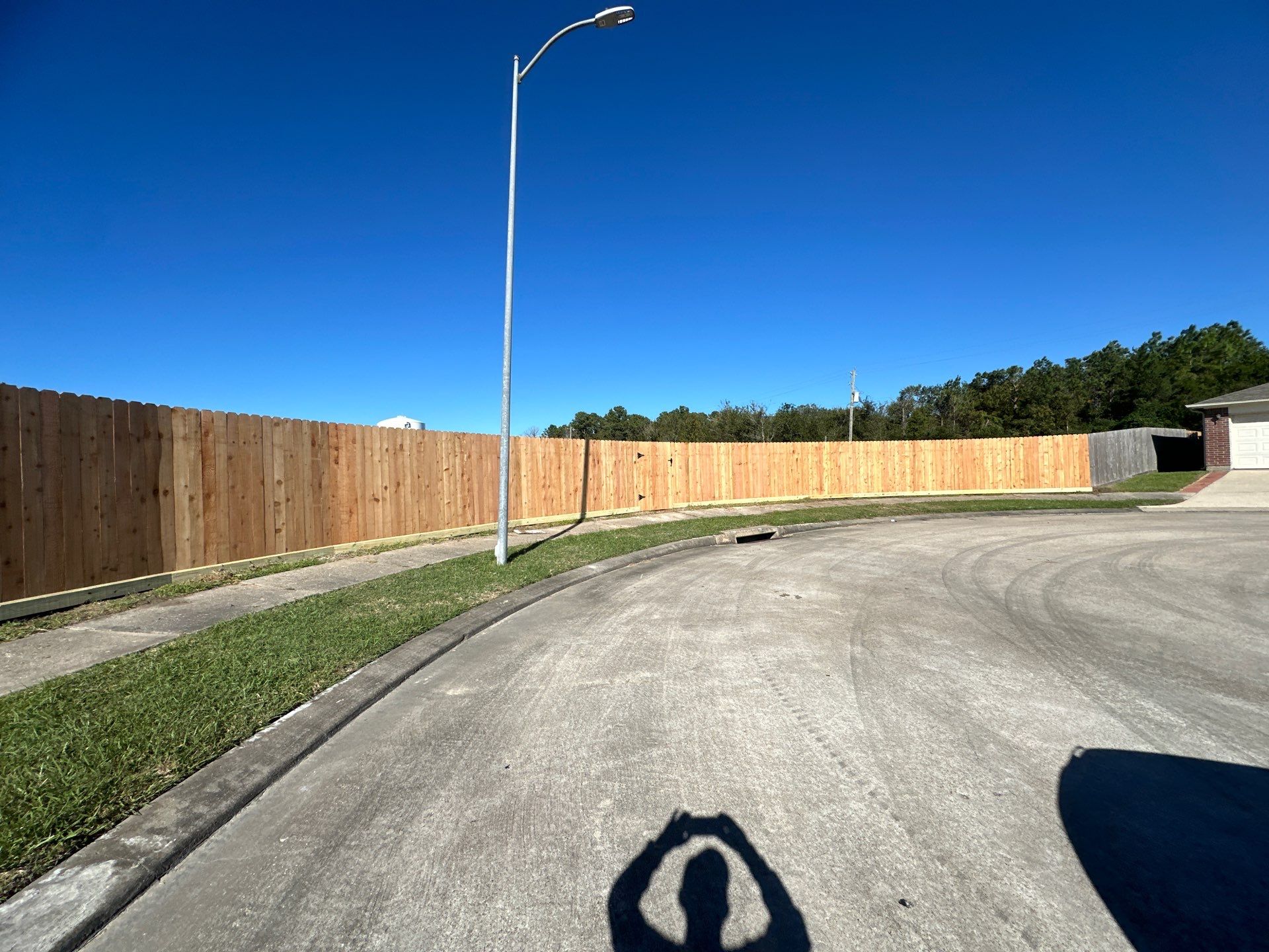 Premium Commercial Fence Installation with Western Red Cedar Pickets, 3 Rails, and Deluxe Wood Gates" by Tim's Fences