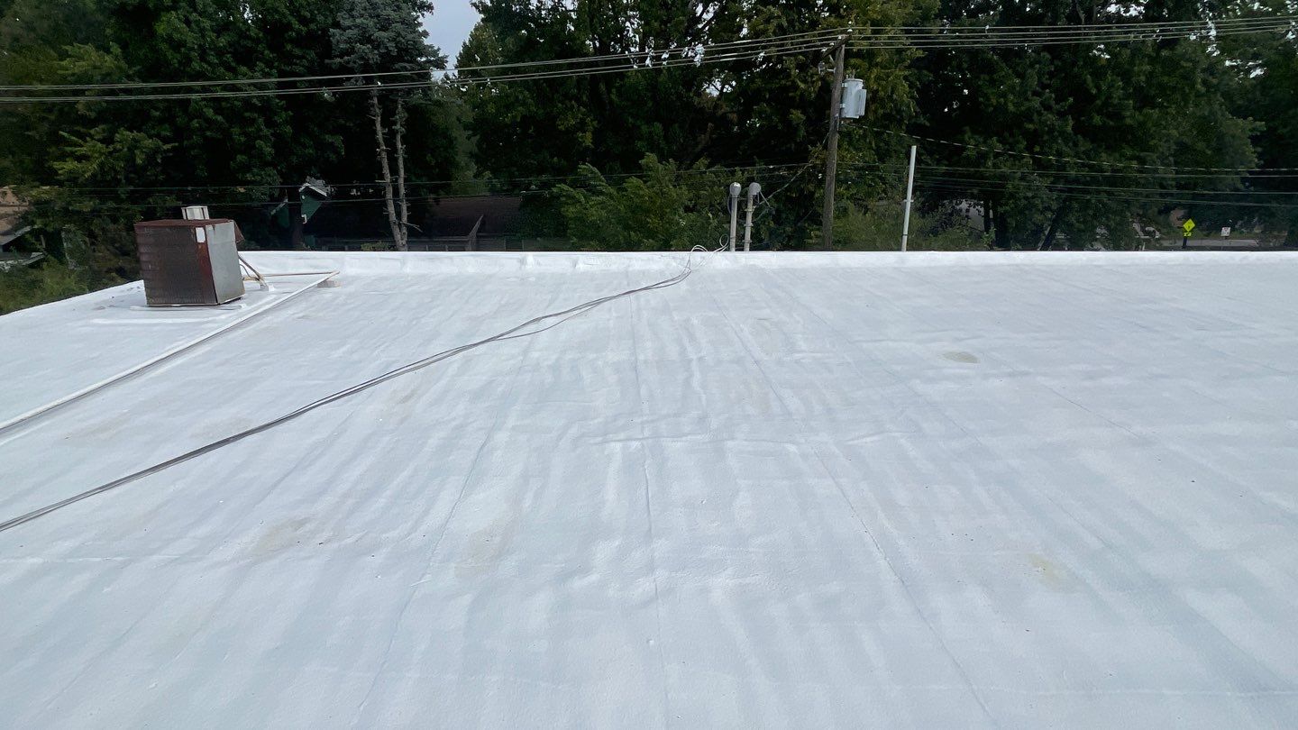 Commercial Roofing Install - SPF Foam & Coatings Restoration System - Color White  by Titan Commercial & Residential Roofing 