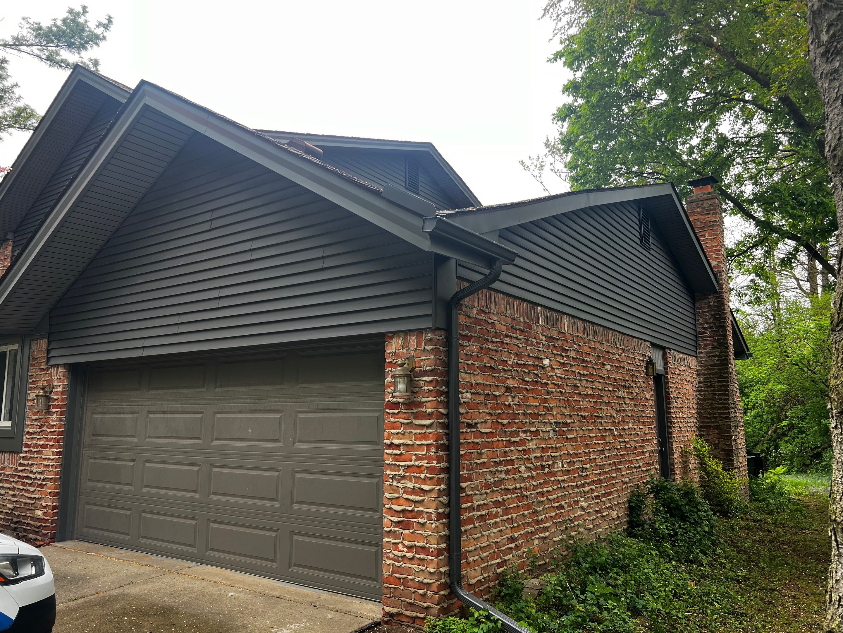Siding Replacement  using Certainteed Monogram Vinyl D4" Smoky Gray color by Bloomfield Construction & Restoration