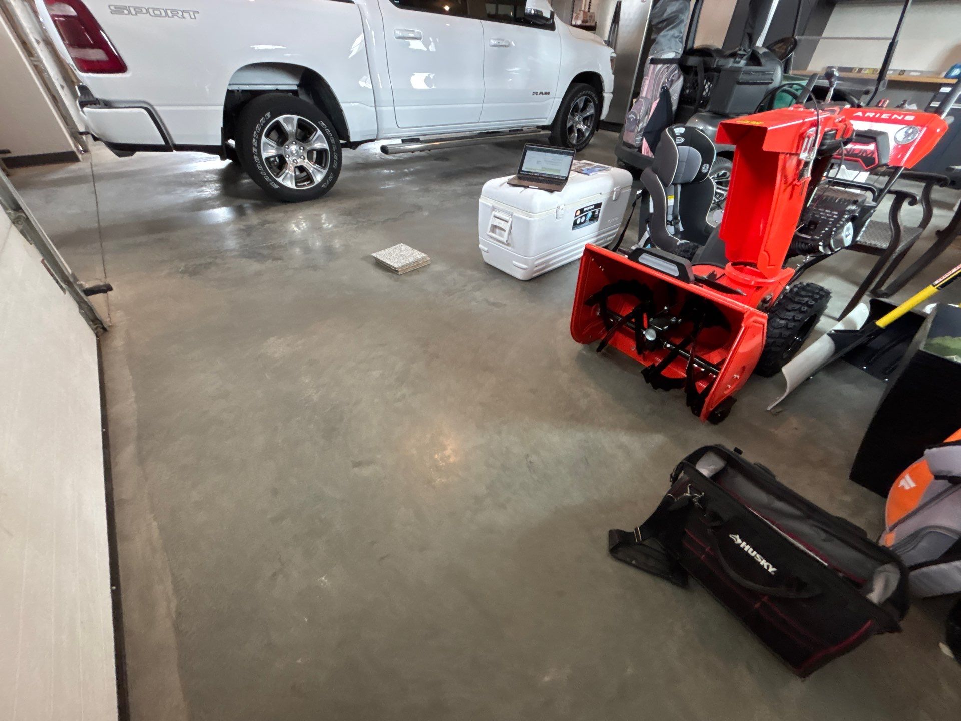 Multi-Car Garage Concrete Coating and Crack Repair in Dell Rapids by Select Painting, Coatings & Garage Cabinets