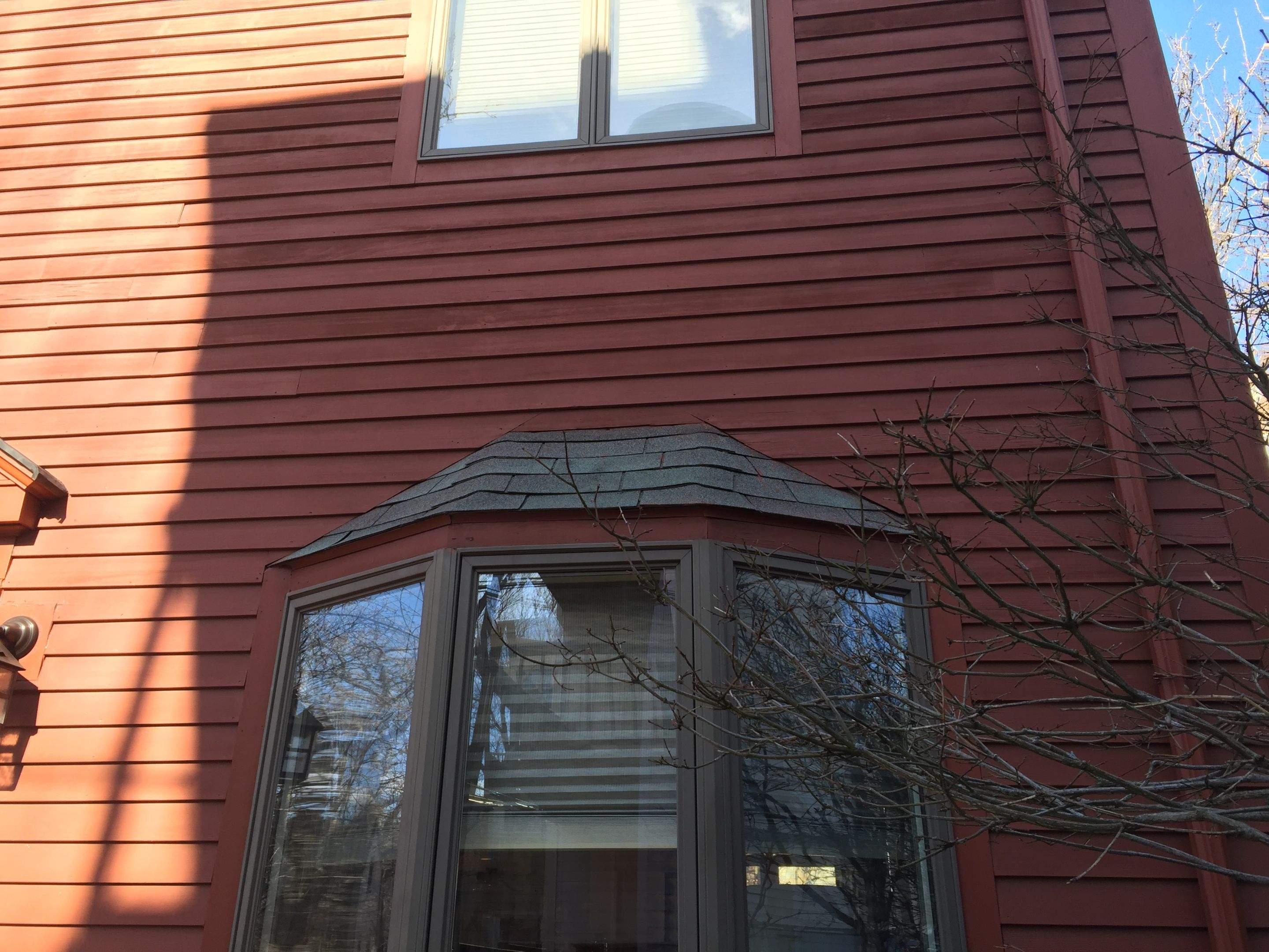 Siding Installation using Cedar Clapboard by Loyalty Exterior Solutions 