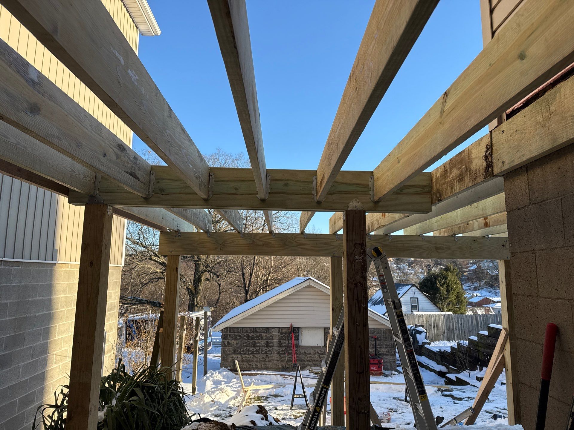 Deck and door by Cousins Roofing Siding & Decks