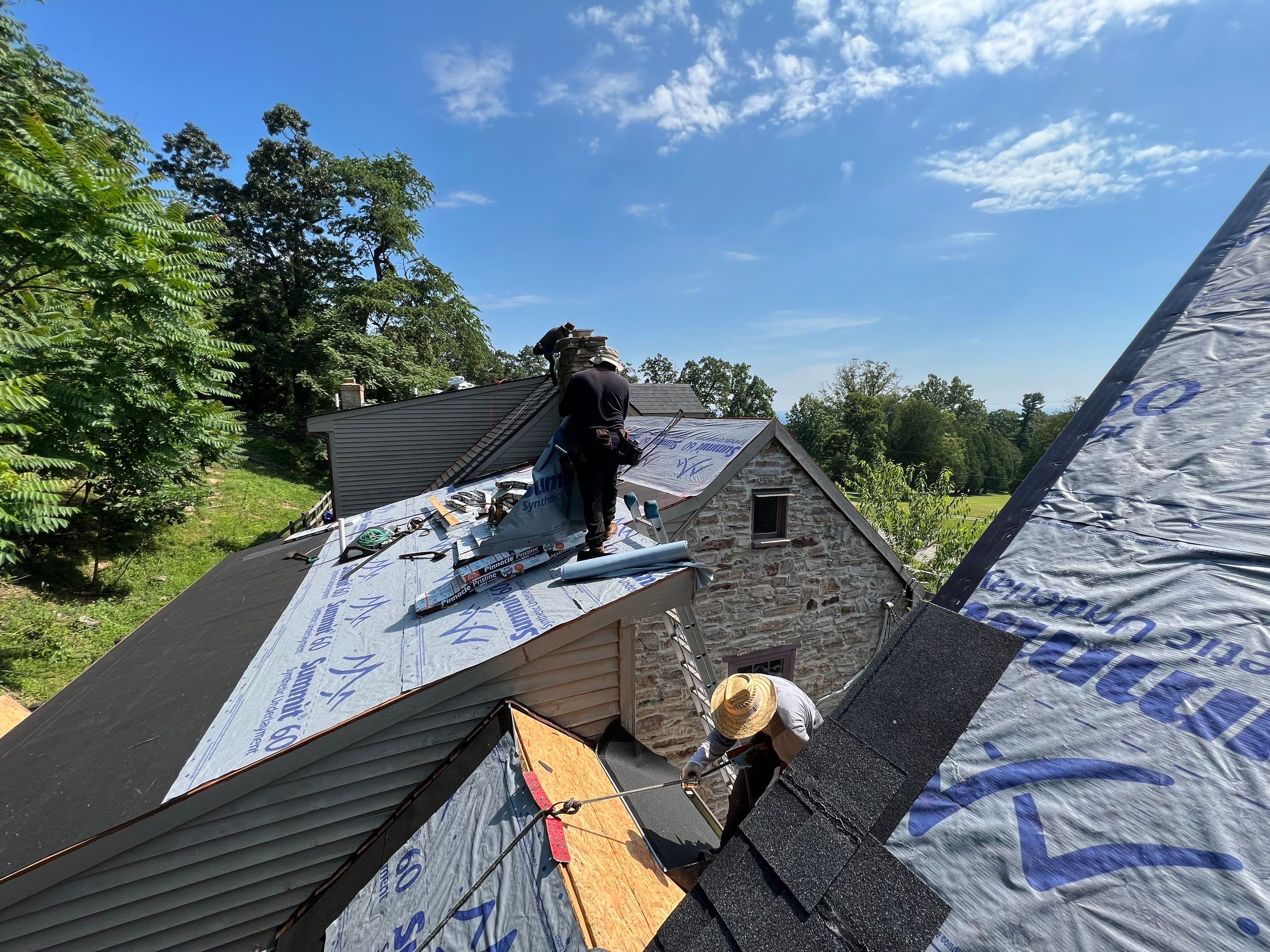 Residential Roofing Installation using Atlas Pinnacle Pristine Black Architectural Shingles by Frederick Roof Repair
