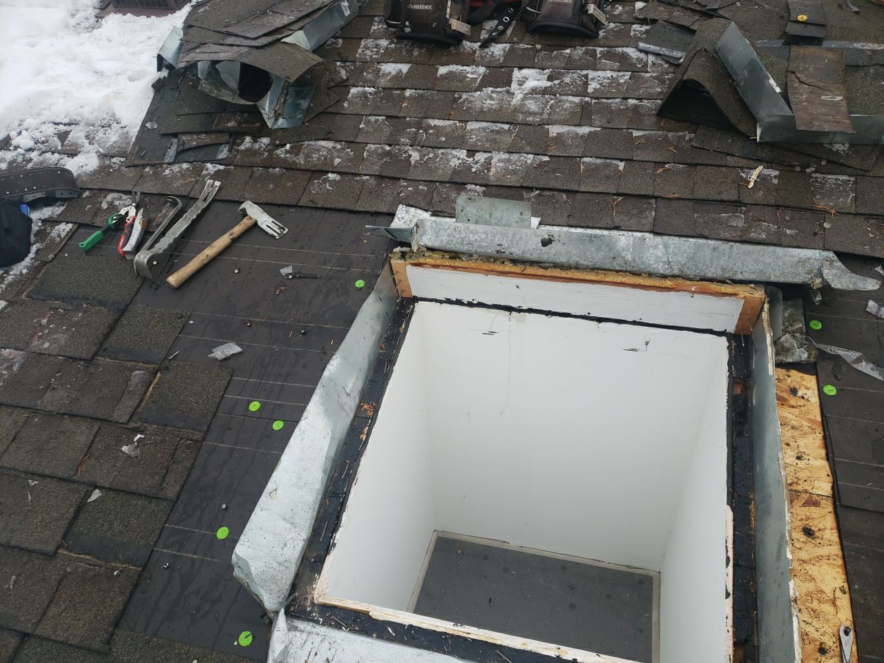 Skylight Removal using Shingle Repair by The Roof Doctor