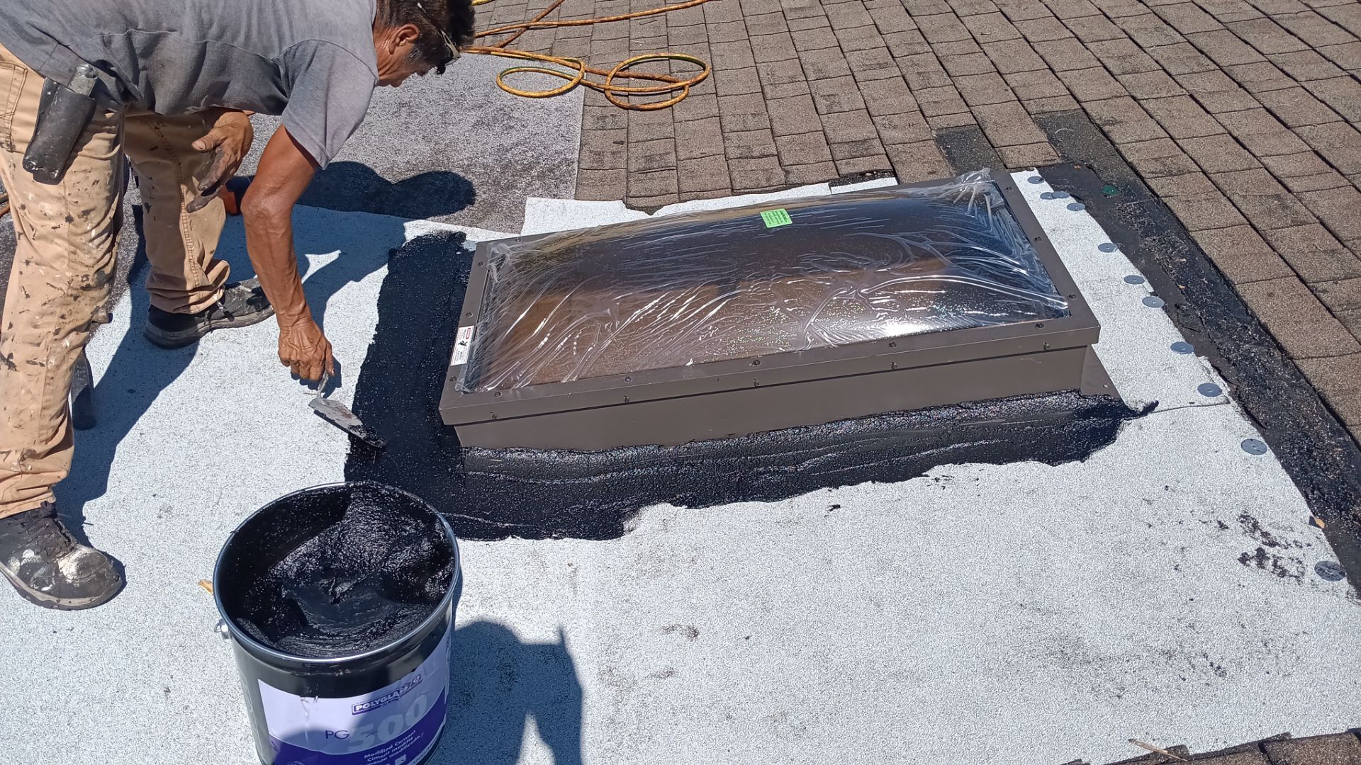 REPLACE NON APPROVED SKYLIGHT ALONG WITH CLOGED GUTTER by Morton Roofing, Inc.