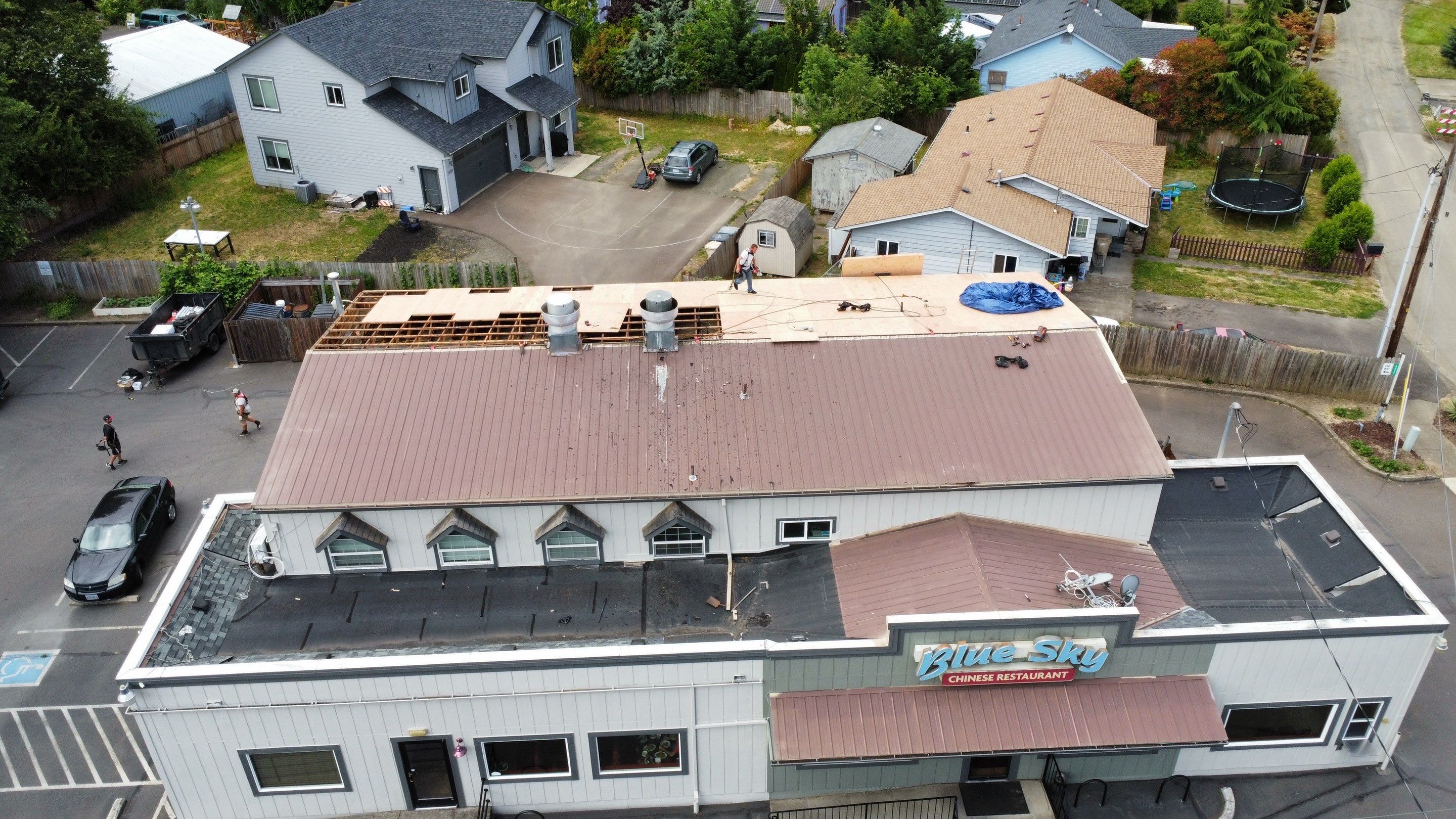 Commercial Flat Roof Installation using Bruce and Dana Snap Lock Metal (Color: Brown) by Orezona Building & Roofing Company, Inc.