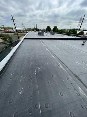 Commercial Roofing Installation using MuleHide EPDM .60 - BLACK