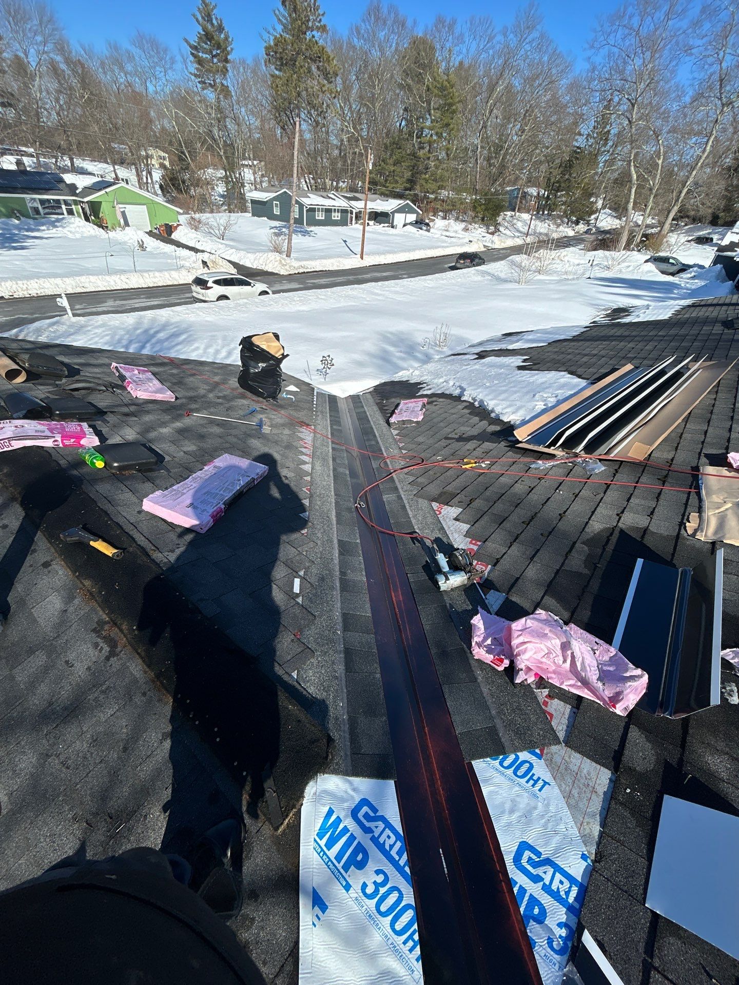 Ridge Cap Replacement & Black Metal Valley Installation in Chelmsford, MA by Mighty Dog Roofing of Greater Middlesex County