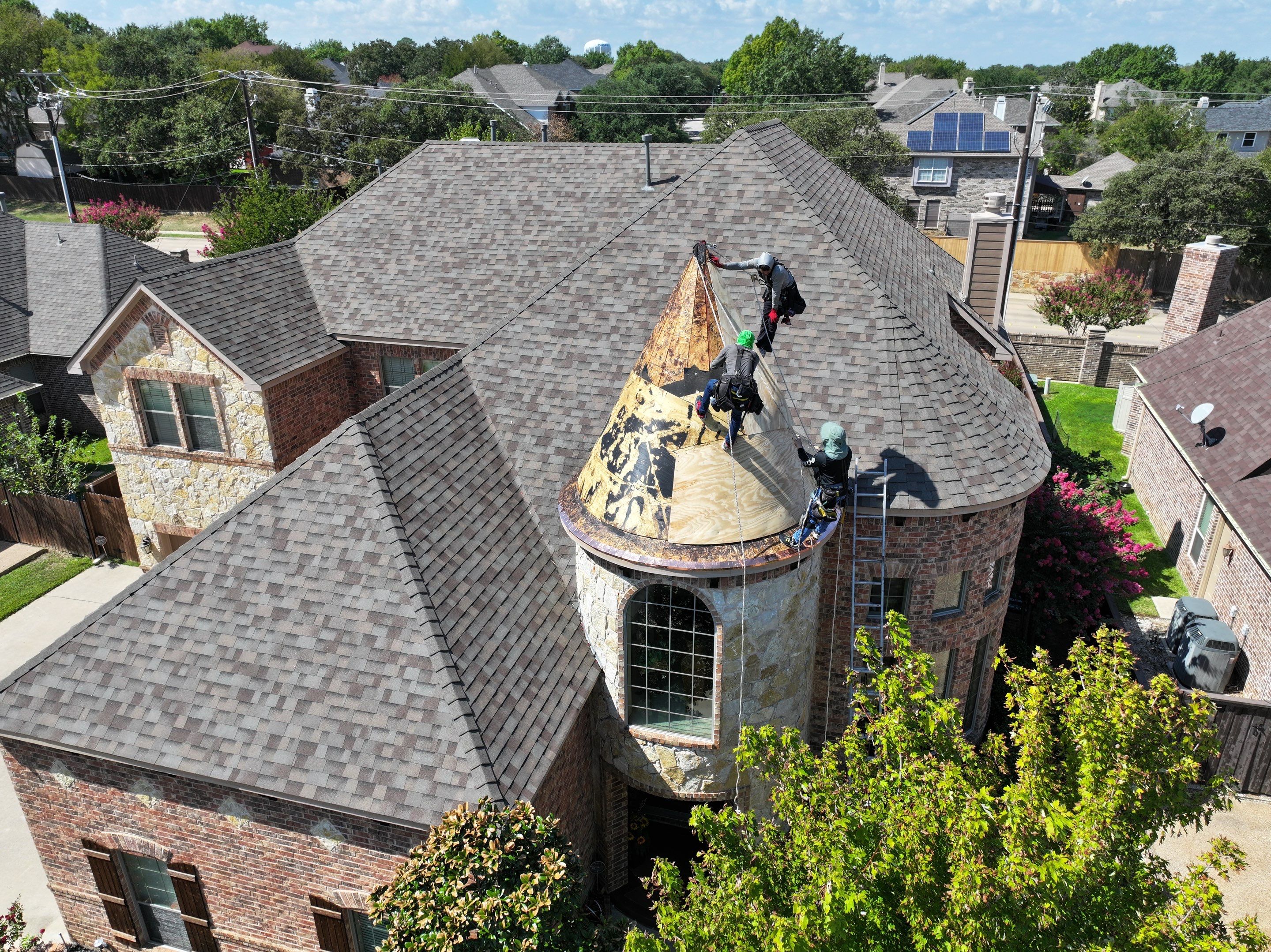 Installing Custom copper turret and Malarkey Vista Class 4 shingles Hail Damage Upgrade by Becker Roofing and Exteriors