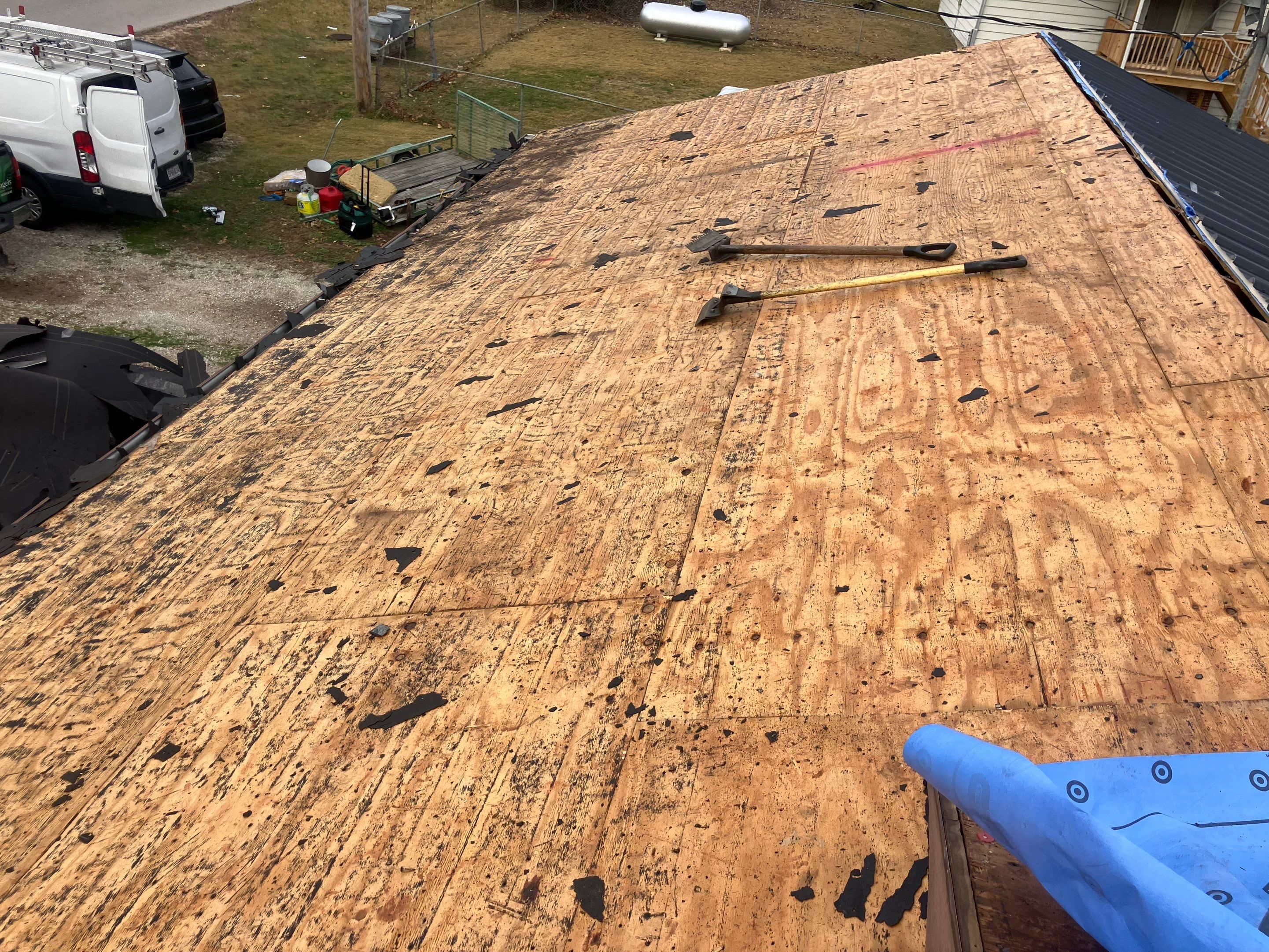 Residential Metal Roof Install - 26 Gauge G-Rib Metal - Color Shiny Black  by Titan Commercial & Residential Roofing 