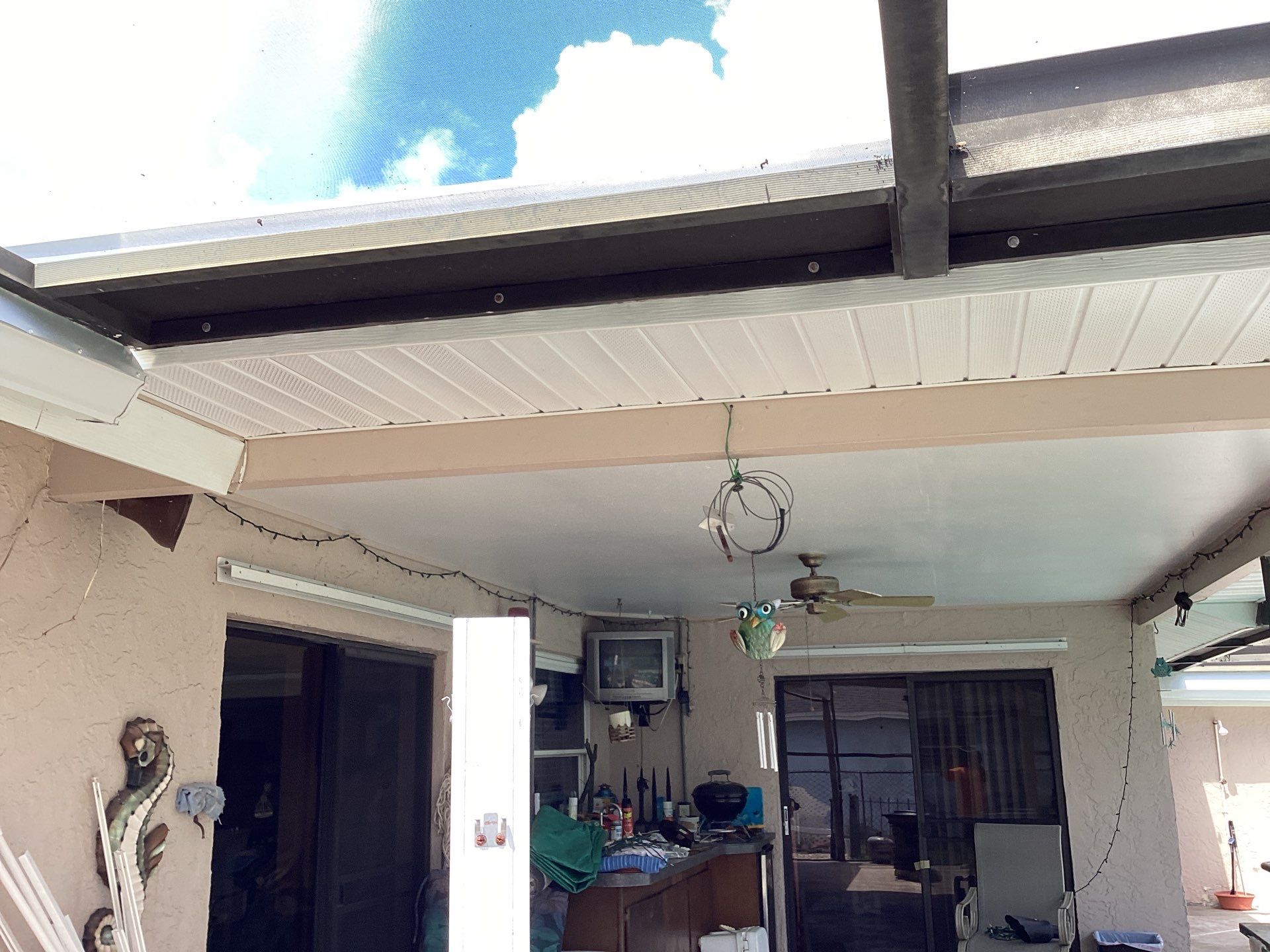 White Seamless Gutters and Splash Guards in Fort Myers FL by Gutter Professor by Gutter Professors