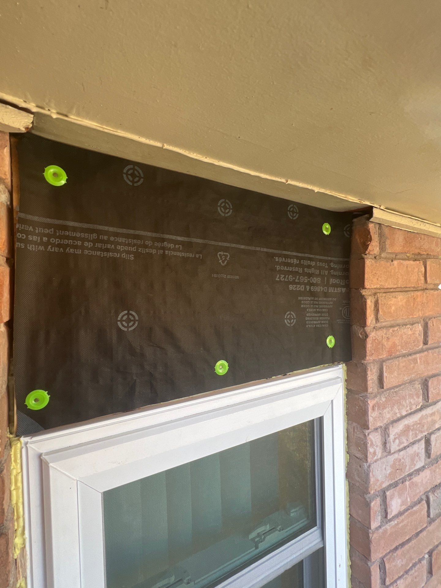 Windows in Brick with a Bay Window by Bayfront Roofing and Construction