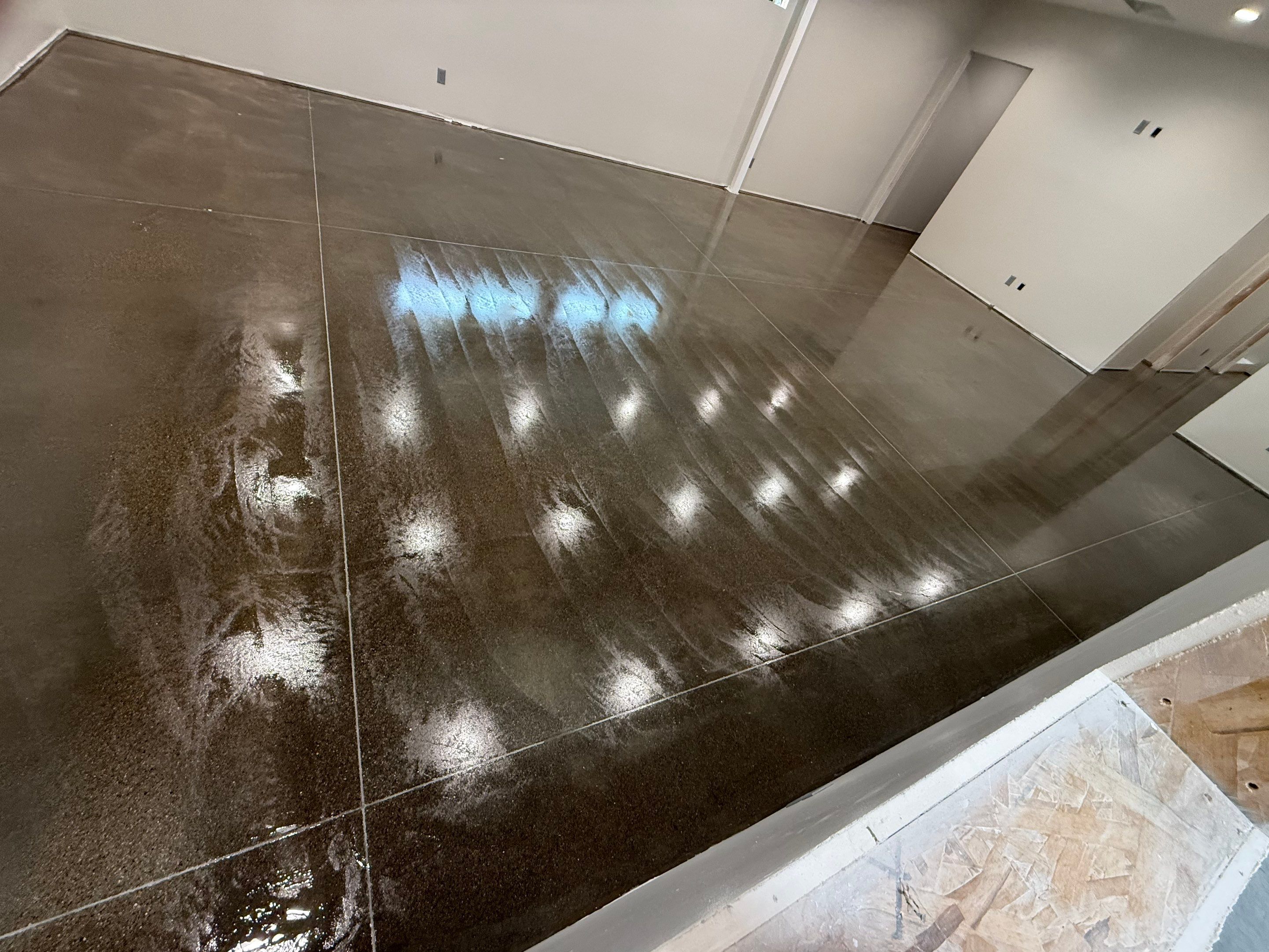 Industrial Concrete Polishing and Coating for Large Manufacturing Warehouse by Select Painting, Coatings & Garage Cabinets