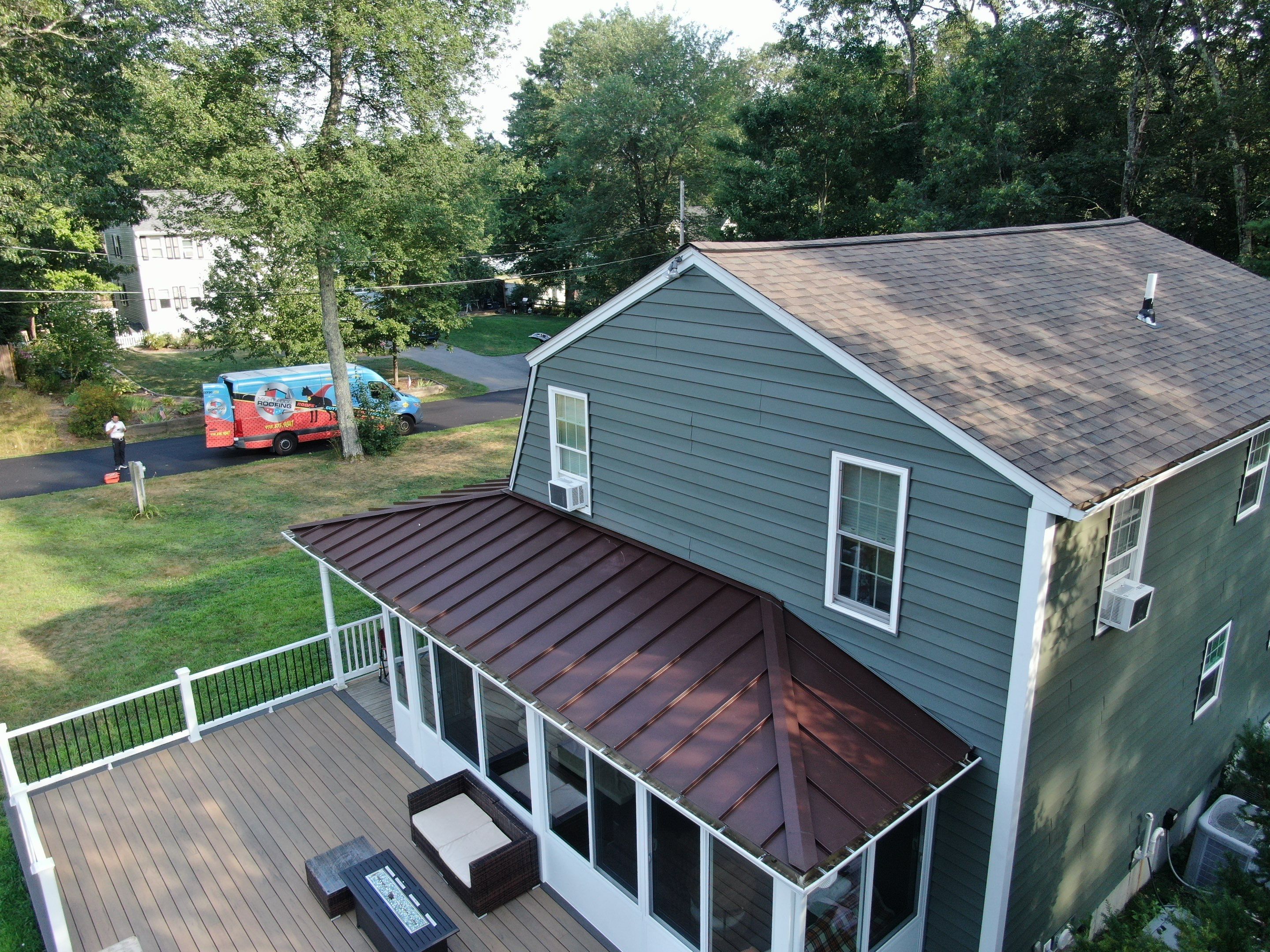 Full Roof Replacement & Farmers Porch Restoration – Asphalt + Standing Seam Metal by Mighty Dog Roofing of Greater Middlesex County