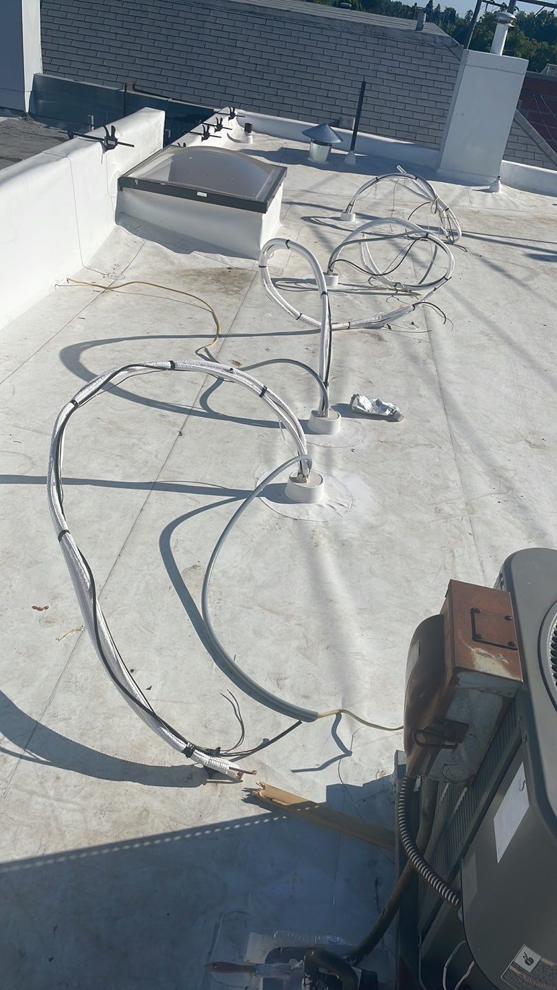 Commercial Flat Roof Installation using GAF 60Mil TPO  by Orezona Building & Roofing Company, Inc.