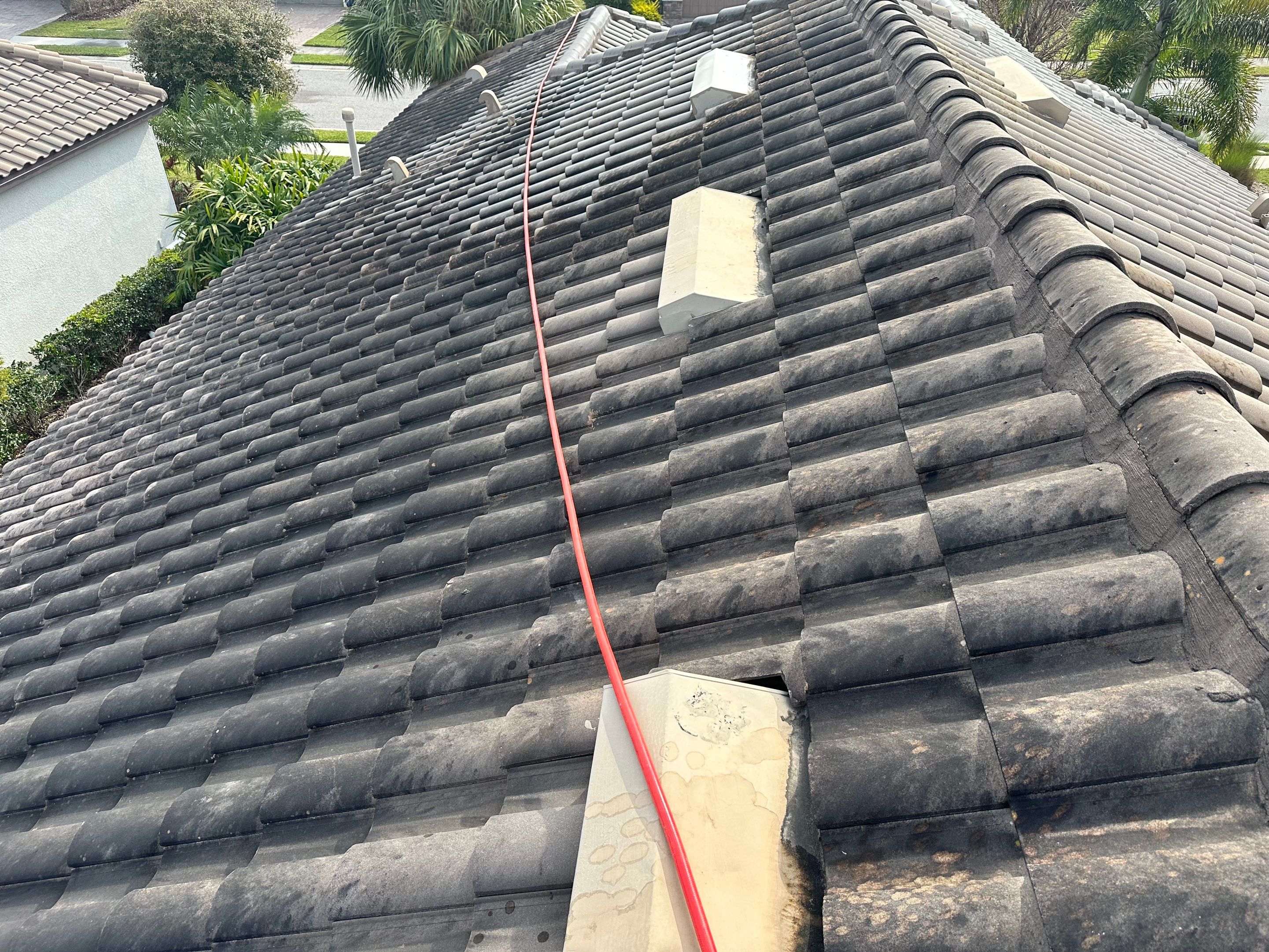 Concrete Tile Roof, Paver Pool Deck, Screen Enclosure & Driveway Cleaning in Artisan Lakes Esplanade, Palmetto, FL | Sunshine AquaWash by Sunshine AquaWash