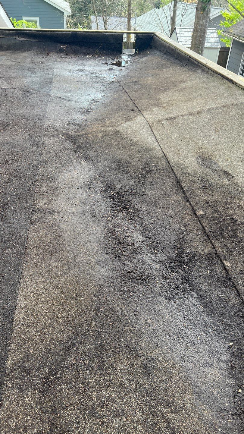 Gutter Cleaning using brown bags by Roof Bullies