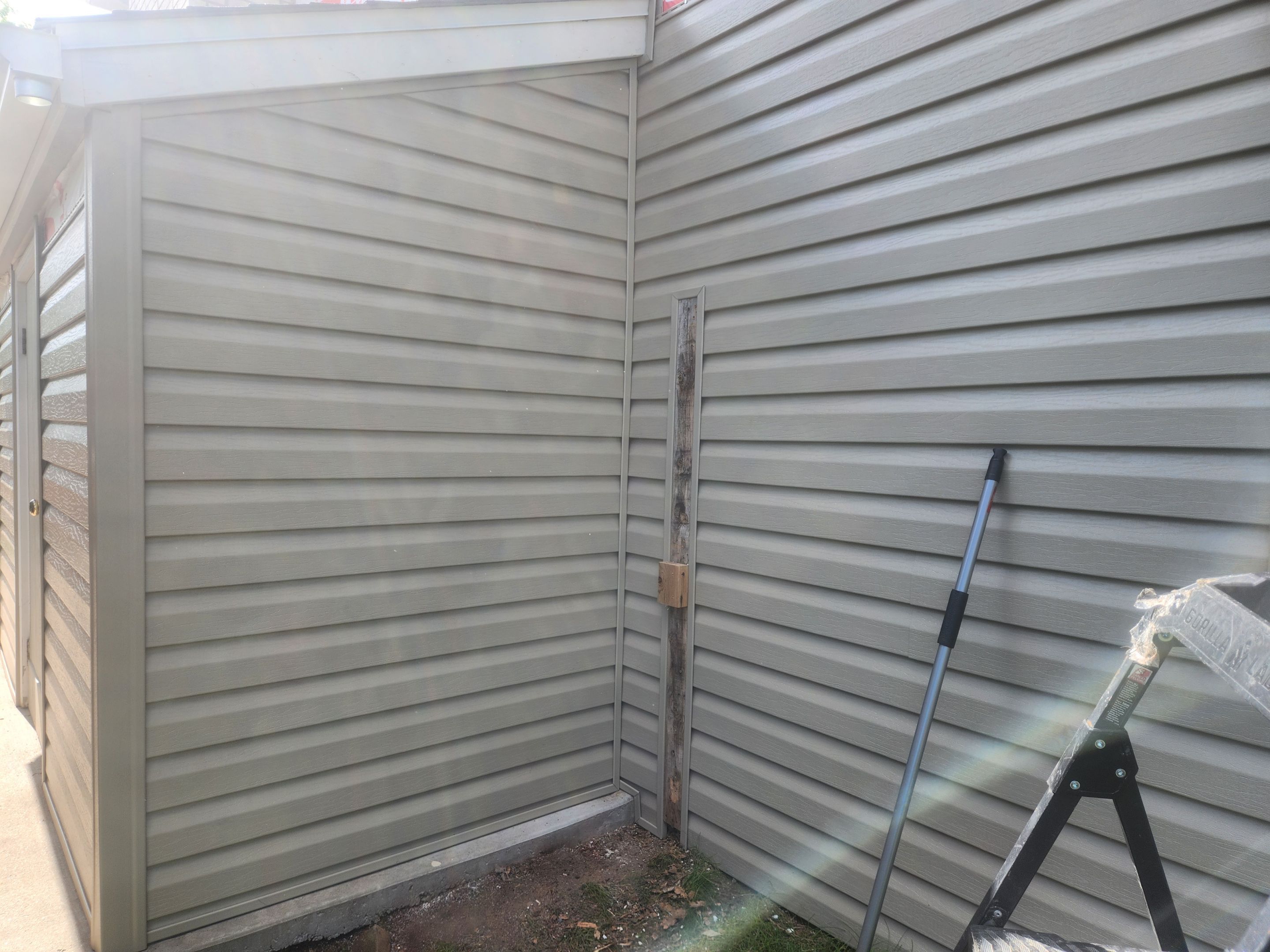 Vinyl siding replacement  by United Windows and Siding LLC