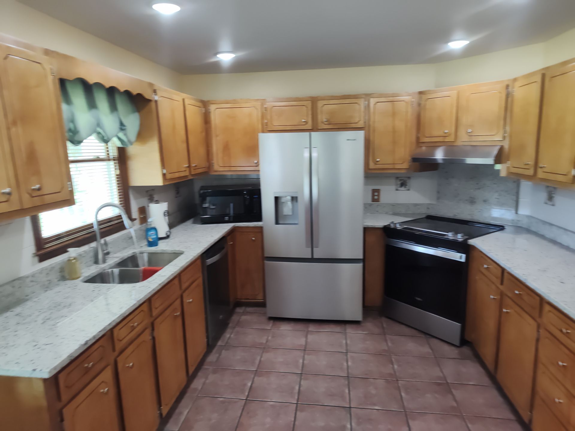 Remodel Kitchen refinishing cabinets by Cornerstone Home Builders, LLC