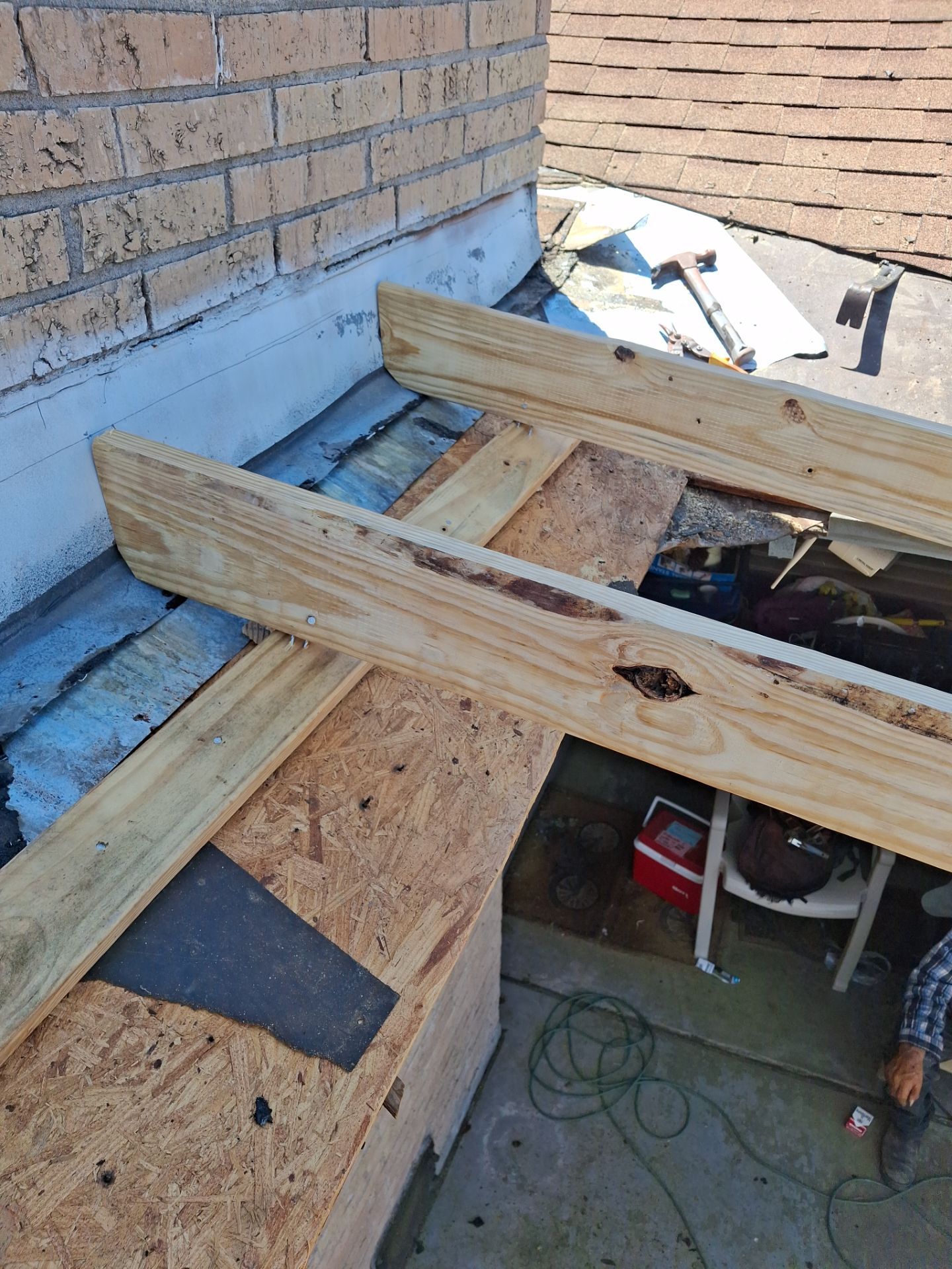 Chimneys need a Cricket.  by Bayfront Roofing and Construction