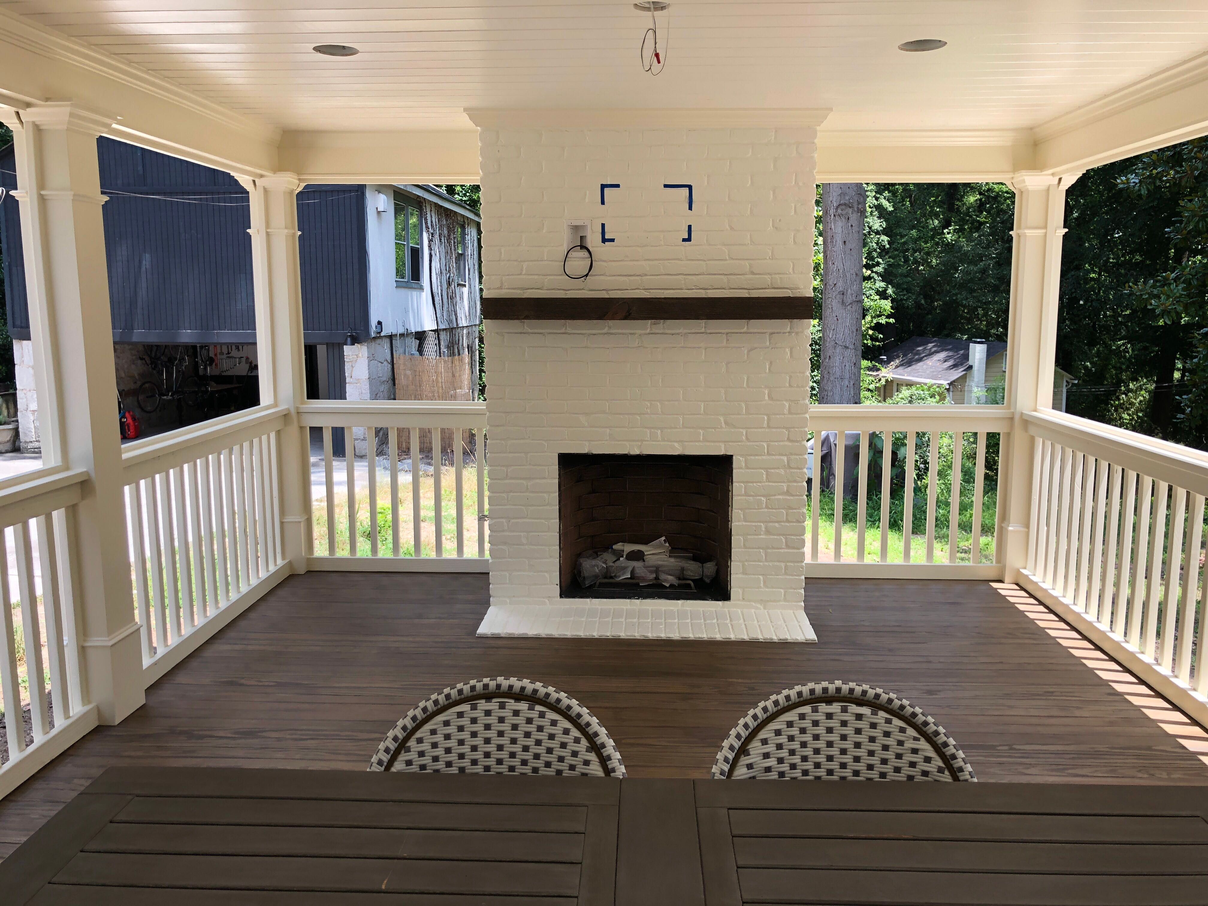 Atlanta Screen Porch Addition Featuring White Brick Outdoor Fireplace by Swift Home Renovations