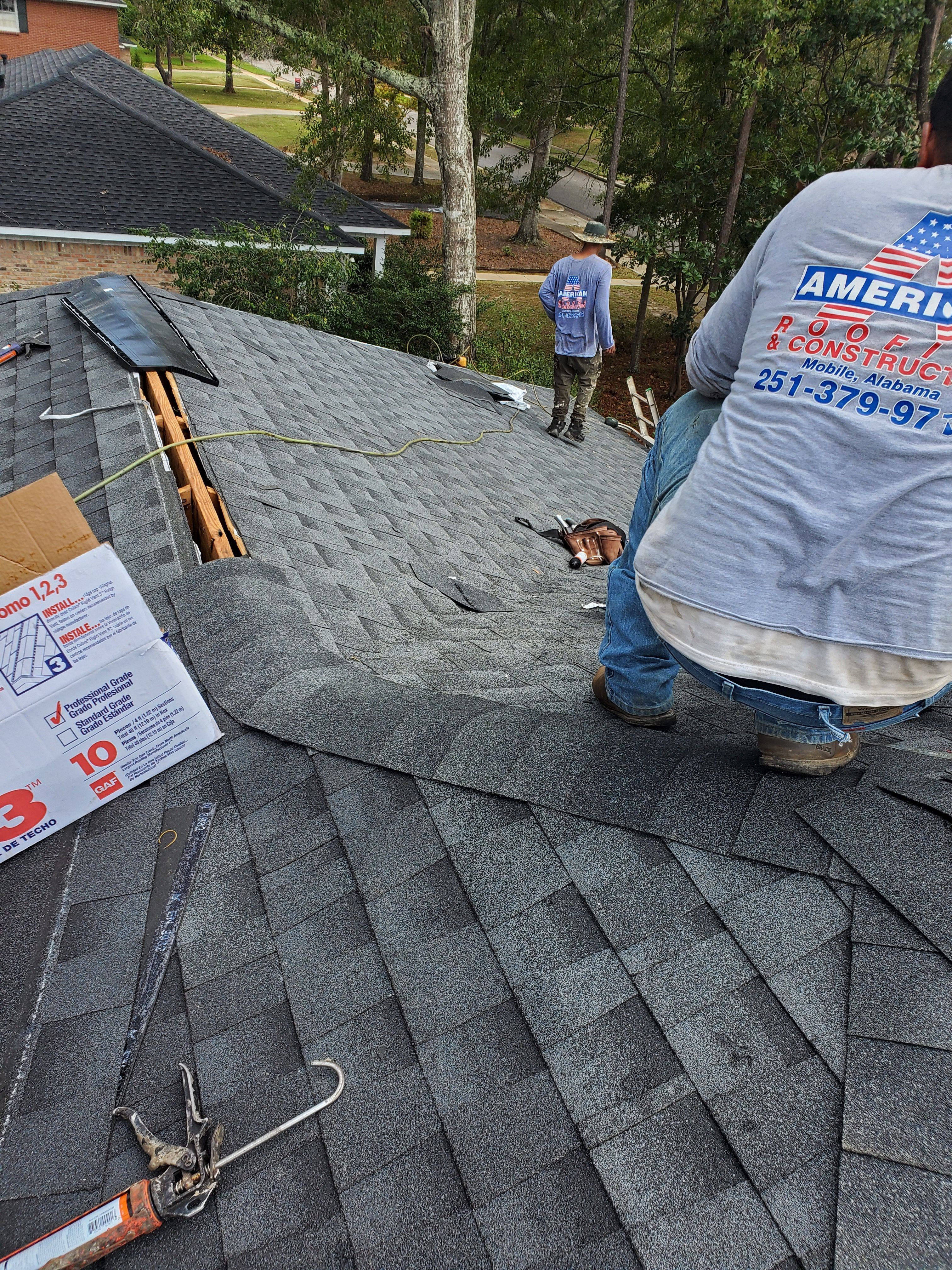 Residential Roofing Installation using Roof Replacement by American Roofing & Construction LLC