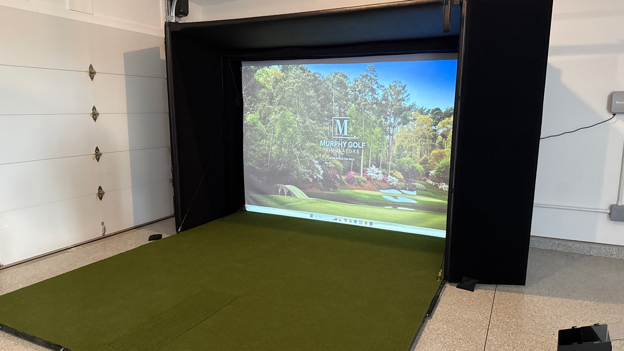Ben Took It To The Next Level With a Golf Simulator by Banner Garage