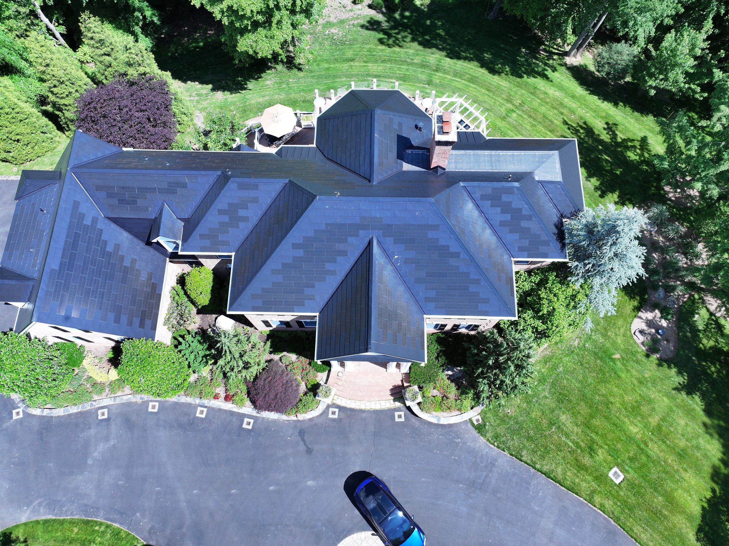 Tesla Solar Roof Replacement by American Home Contractors