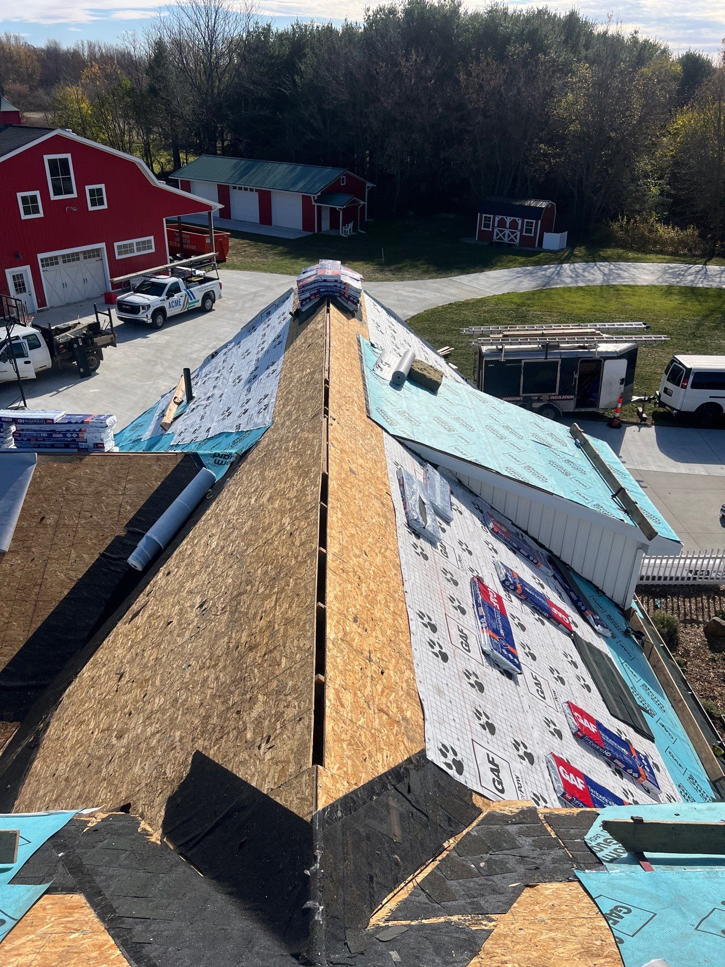 Residential Roofing Replacement with Multiple Skylights in Mason, Michigan by Acme Exteriors